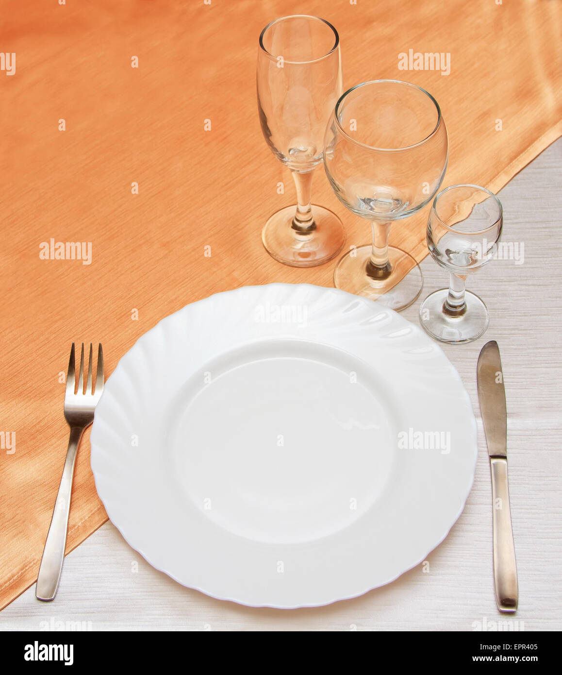 dinner plate, knife and fork Stock Photo