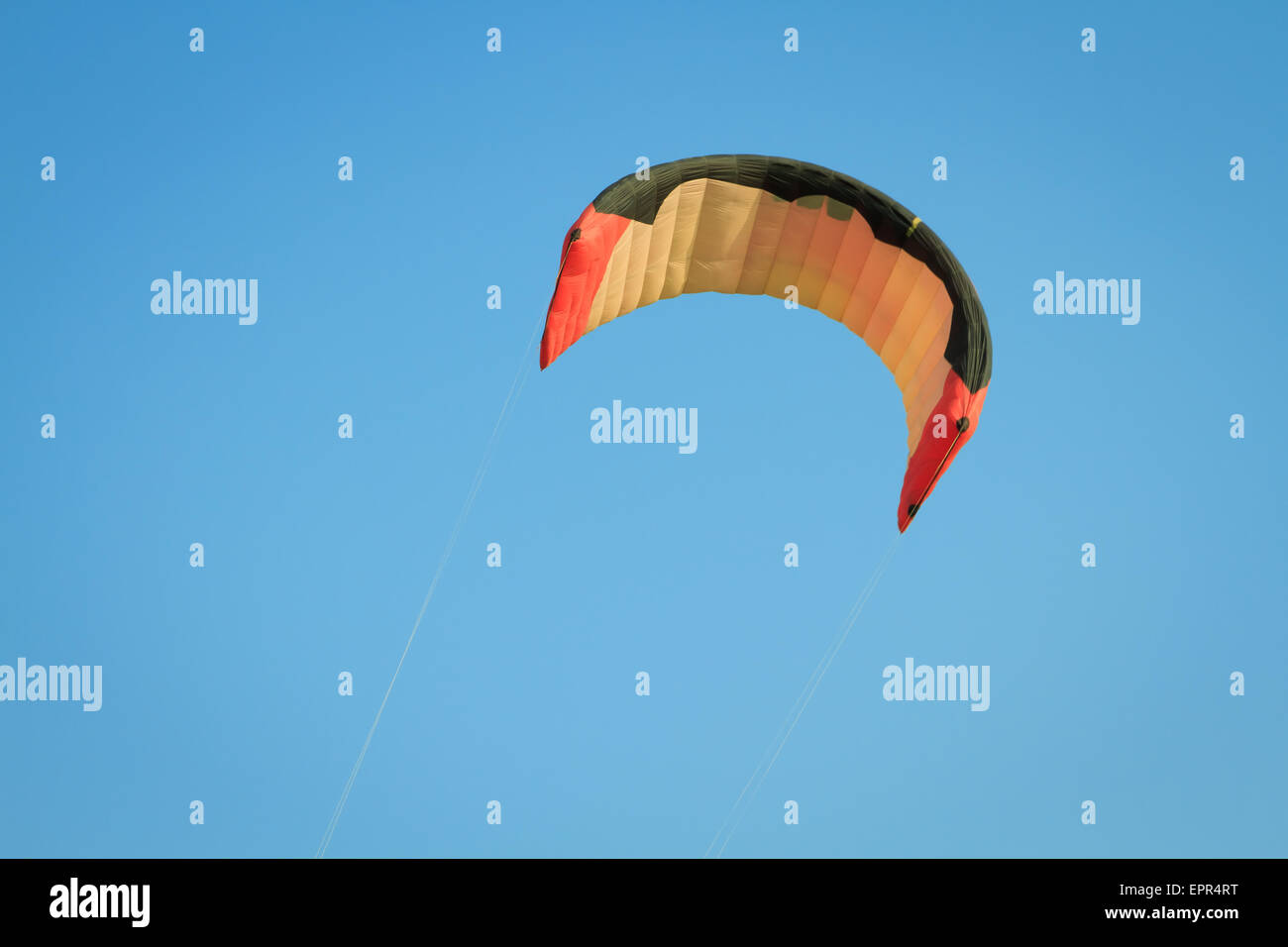 kite wing over blue sky Stock Photo