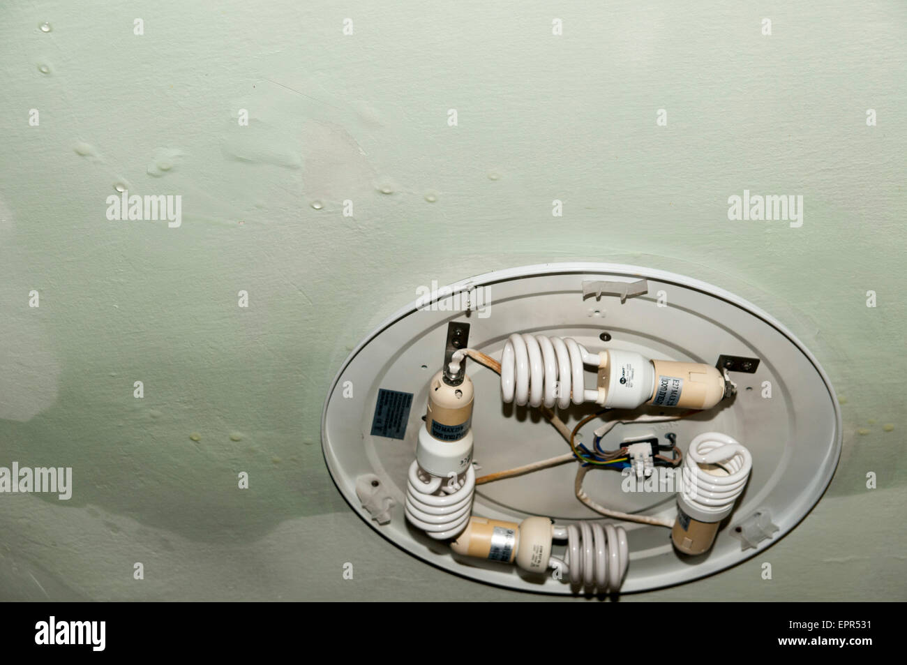 Leaking Ceiling Water Drips Through A Damaged Roof As It