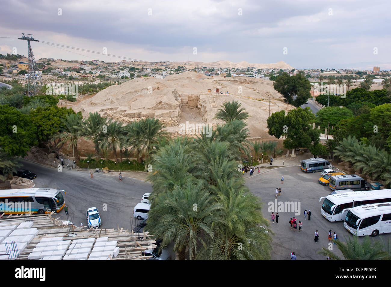 JERICHO, ISRAEL - OCT 15, 2014: Tourists visiting the oldest city in the world Jericho also called Tell es-Sultan. The mound is Stock Photo