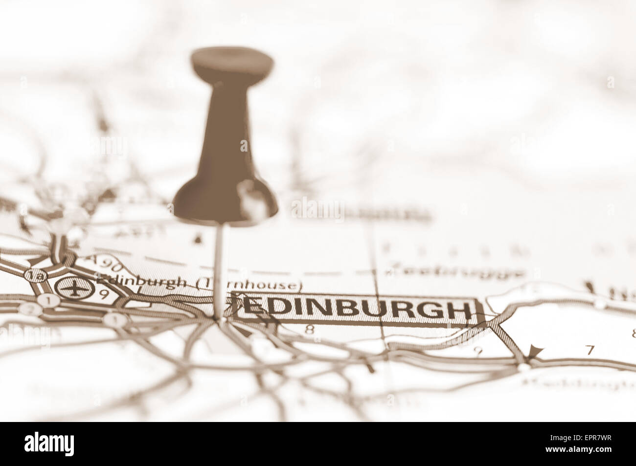 Pushpin showing Edinburgh City On Map, Scotland with vintage sepia filter effect. Travel Destination Concept Stock Photo