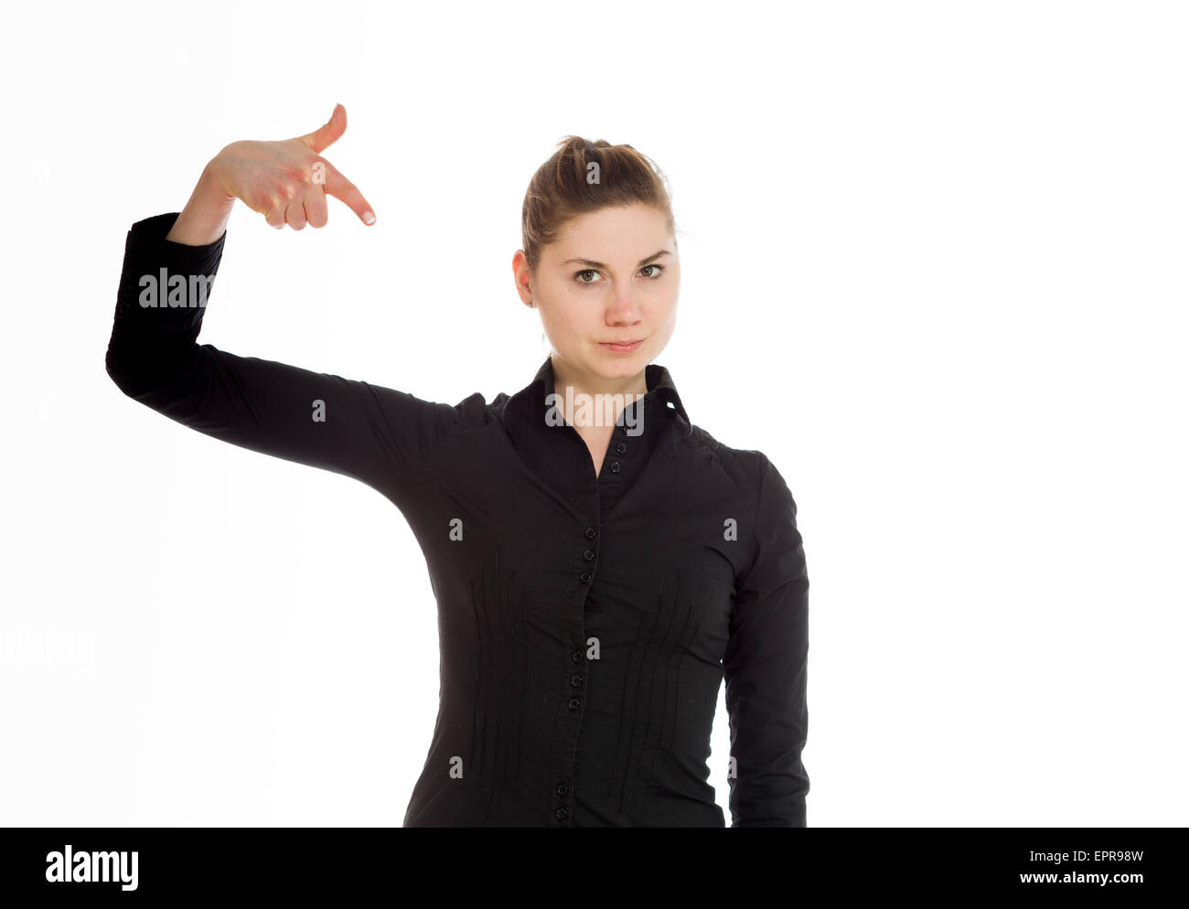 Subtle Pointing Model isolated on plain background in studio pointing Stock Photo - Alamy