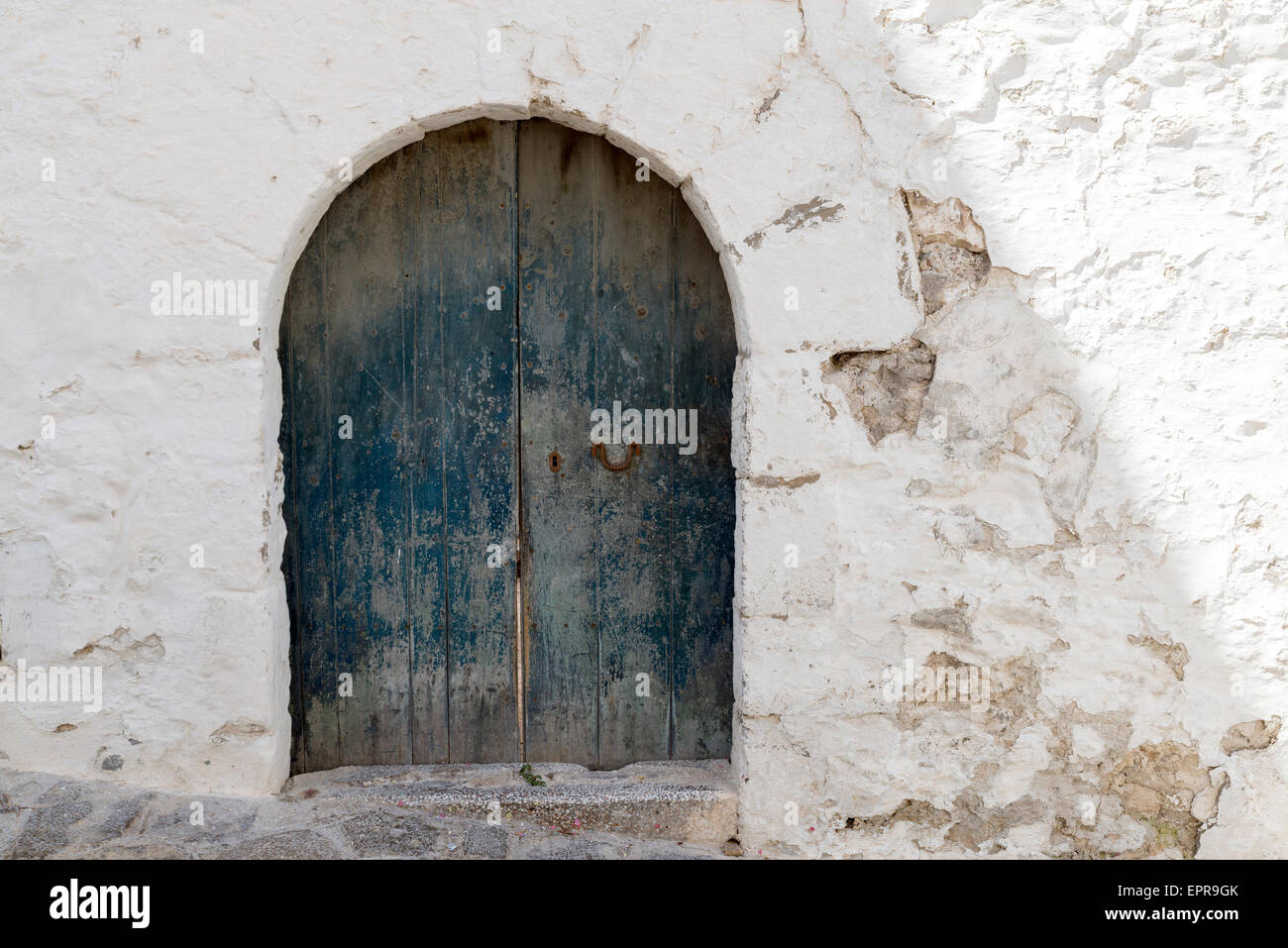 old door on a whitewashed wall. Ibiza Stock Photo