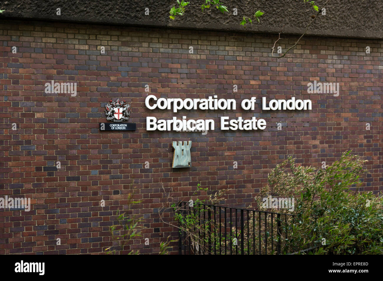 Corporation of London Barbican Estate sign on brick wall. Stock Photo