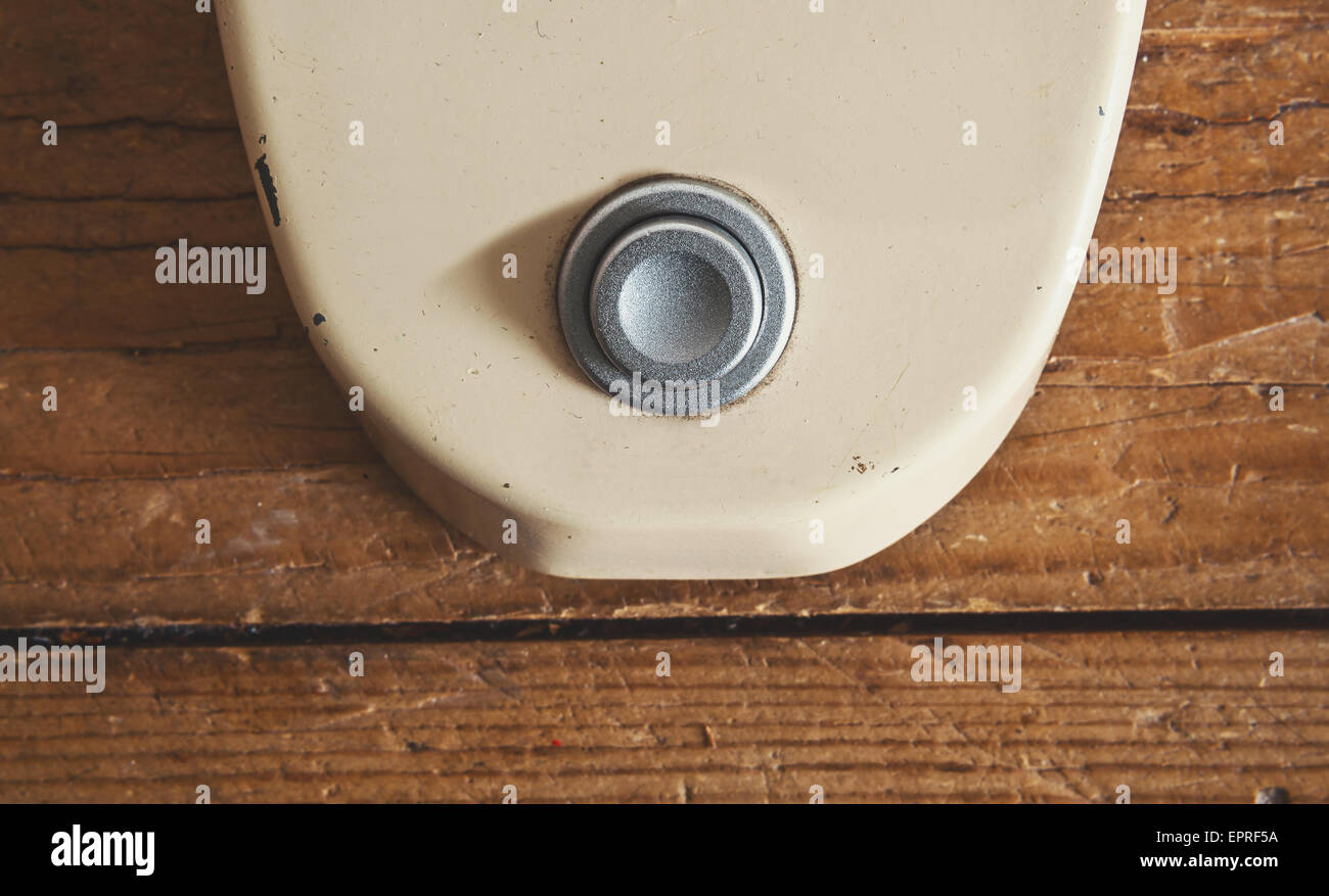 Details of a button on an old guitar pedal. Stock Photo