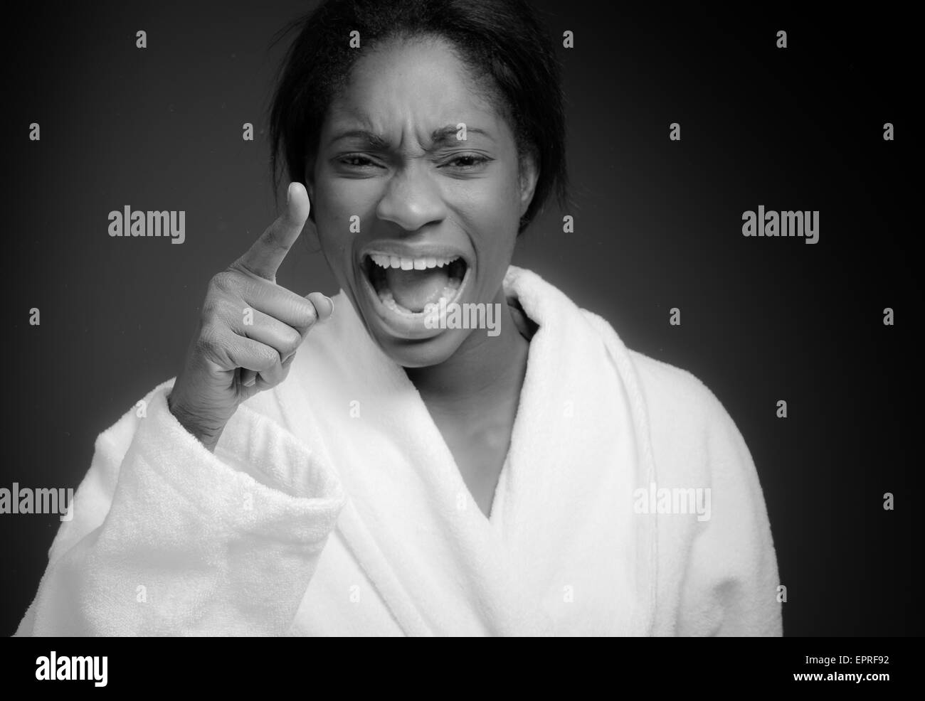 Model angry scolding and pointing Stock Photo