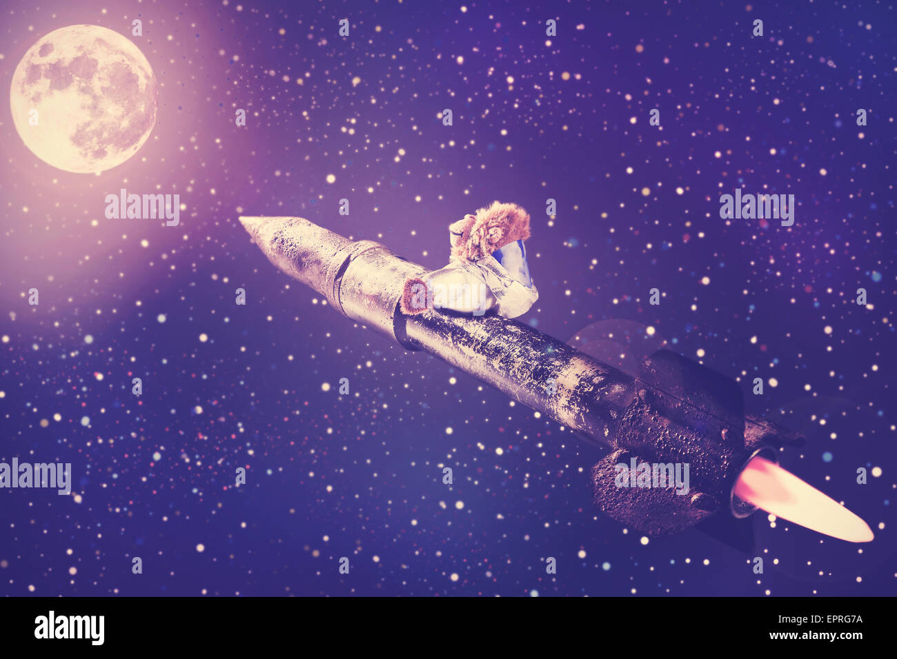 Monkey mascot in rocket flying to the moon. Stock Photo
