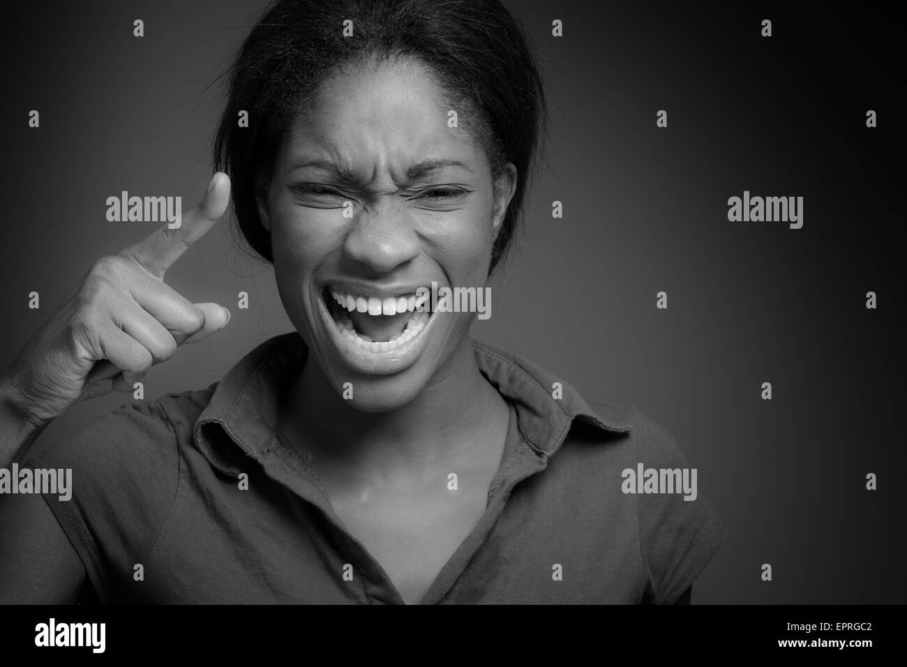 Model angry scolding and pointing Stock Photo