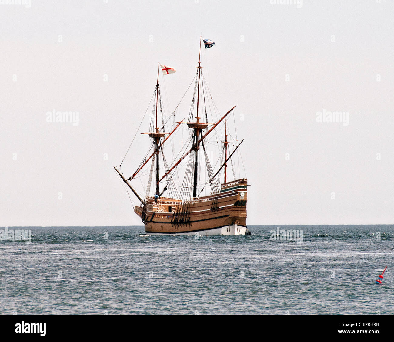 The Mayflower II, a replica of the original pilgrim ship Mayflower departs Buzzards Bay as it heads back to homeport in Plymouth after renovations May 20, 2015 in Buzzards Bay, Massachusetts. The Mayflower II first launched in 1957 and has been undergoing renovations at Mystic Seaport in Connecticut since December. Stock Photo