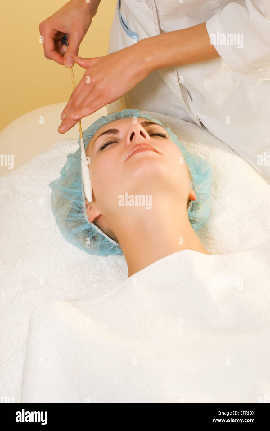 Facial cryogenic massage Stock Photo