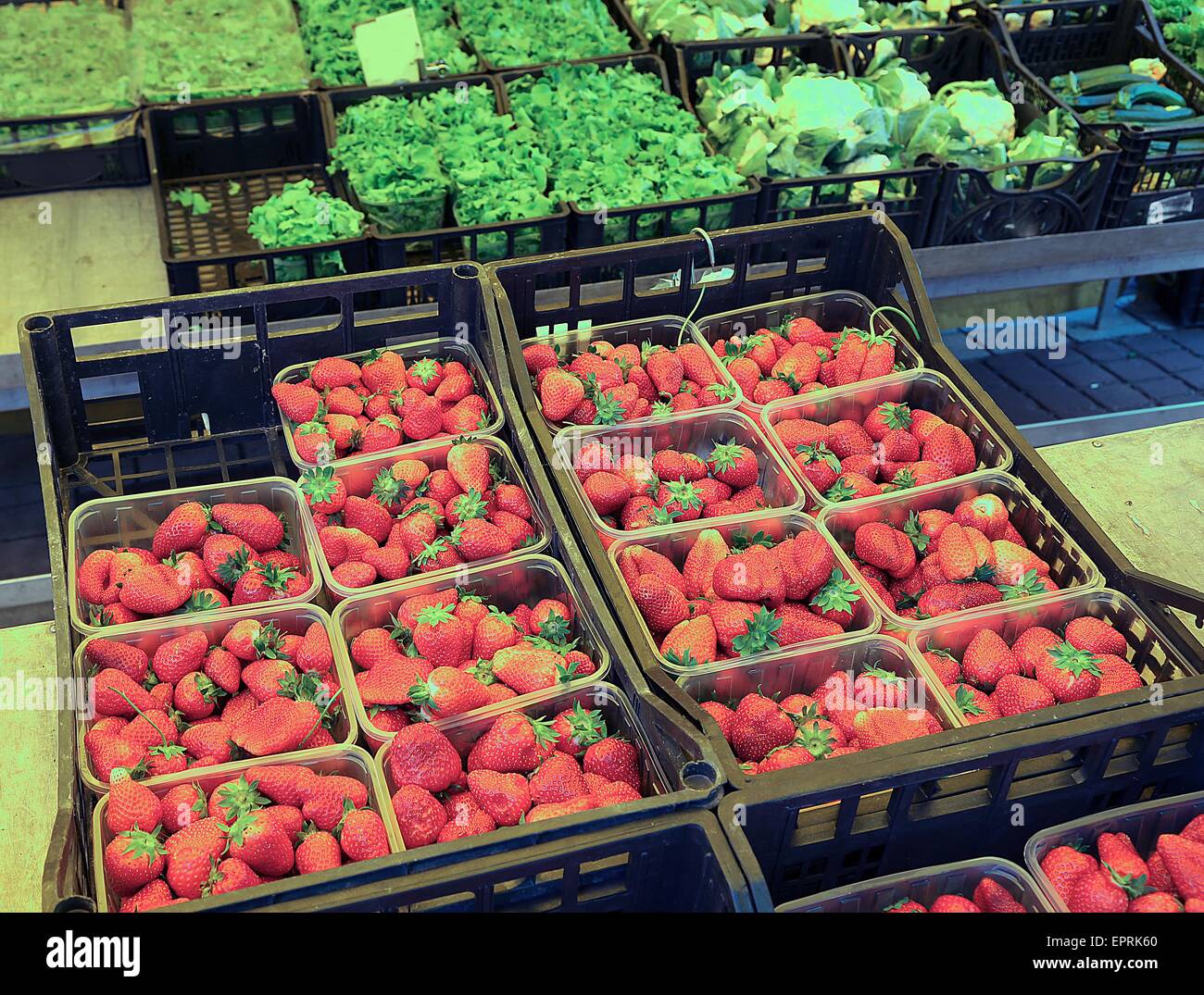 strawberries and vegetables in the grocery store Stock Photo Alamy
