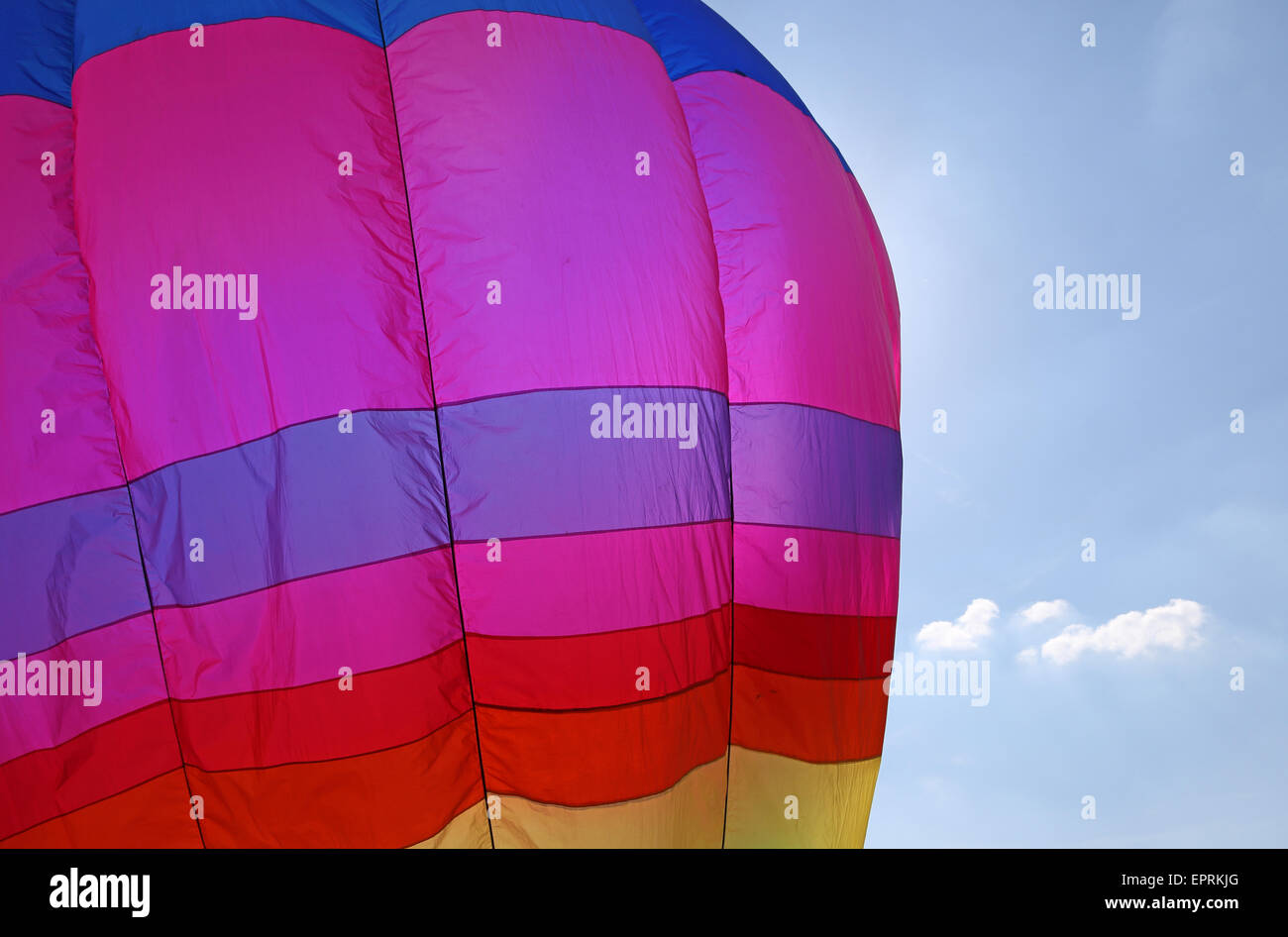 colorful hot air balloon flies in sky blue Stock Photo - Alamy