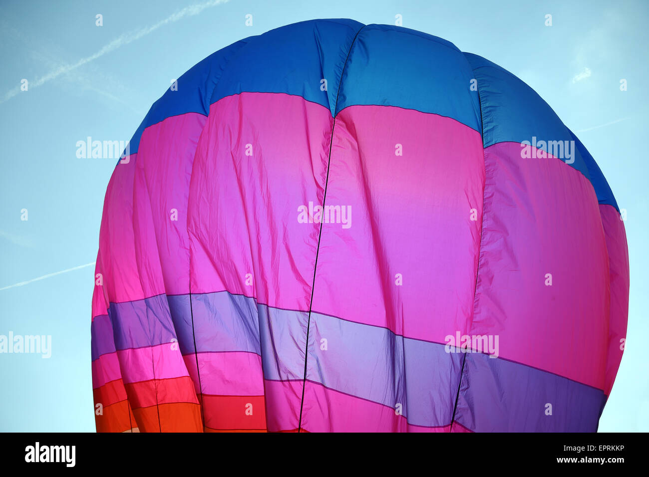 large colorful hot air balloon is flying in the blue sky Stock Photo ...