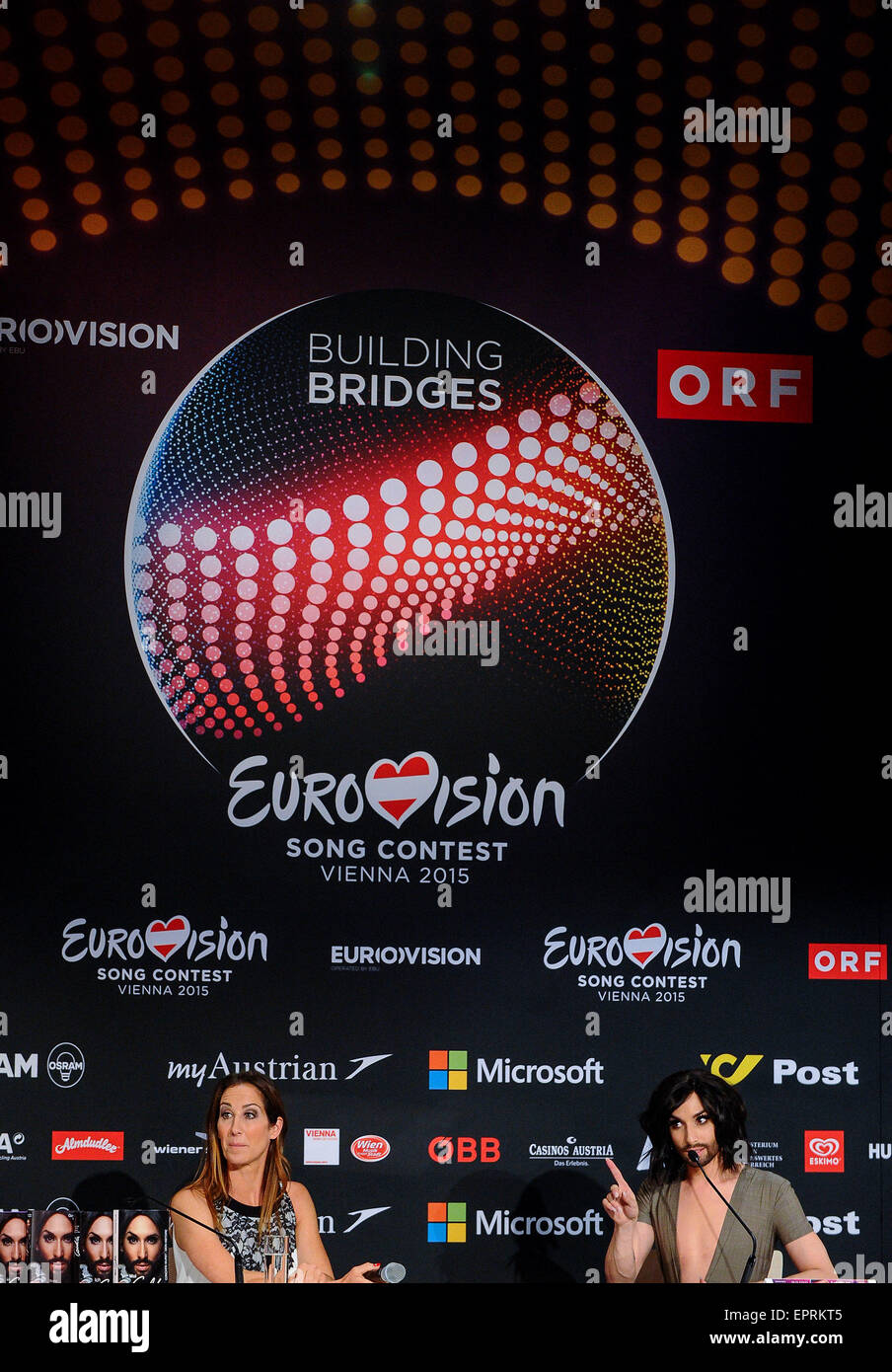 Vienna, Austria. 21st May, 2015. Last year winner Conchita Wurst (R) attends a press conference of the 60th Eurovision Song Contest (ESC) in Vienna, Austria, on May 21, 2015. © Qian Yi/Xinhua/Alamy Live News Stock Photo