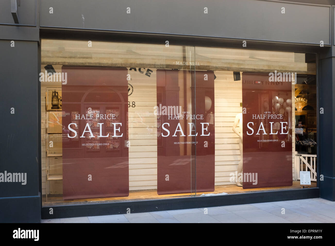A shop with a 'sale' sign. Stock Photo