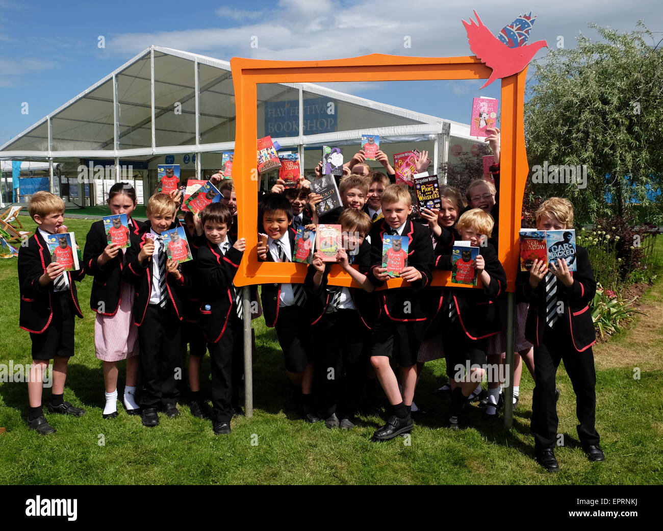 Hay Festival, Powys, Wales, UK. 21st May, 2015. Opening day for the 2015 Hay Festival. Children from Lucton Preparatory School, Herefordshire attend the first day of the Festival and show the books they have bought. Stock Photo