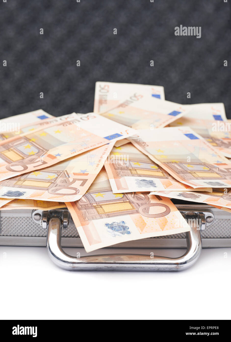 Suitcase full of money Stock Photo Alamy