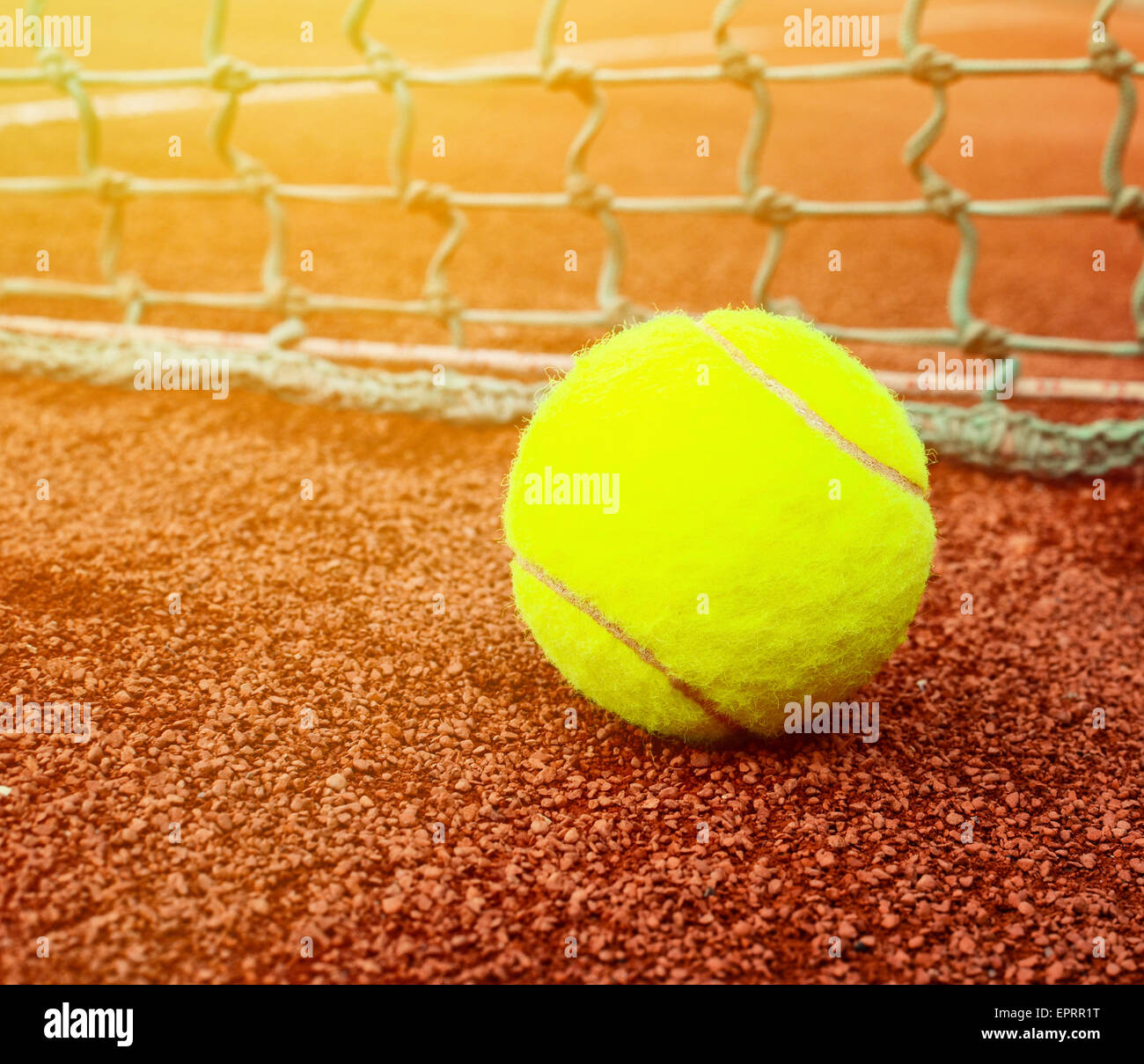 Tennis ball on clay Stock Photo Alamy