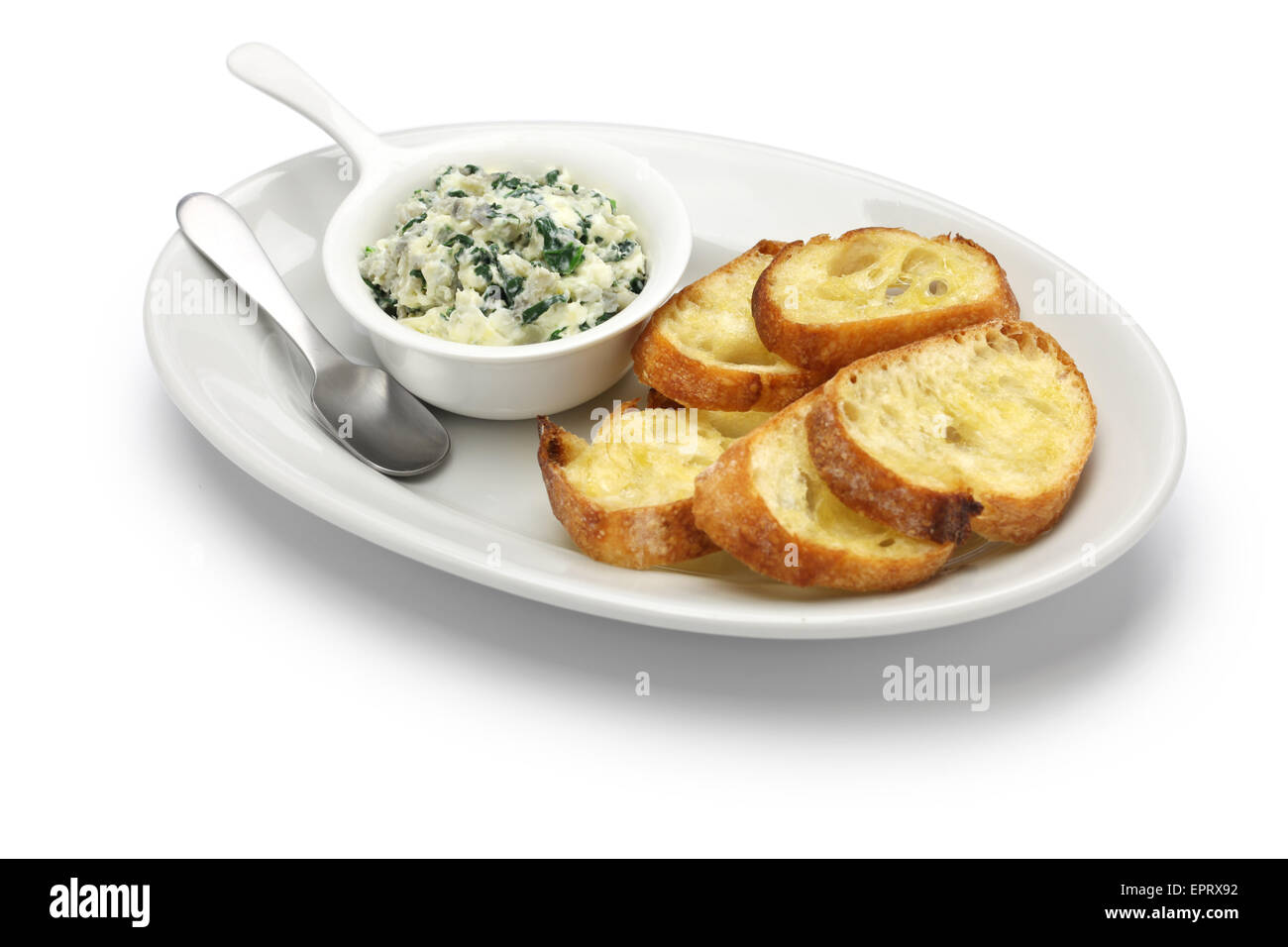 artichoke spinach dip, healthy vegetarian food isolated on white background Stock Photo