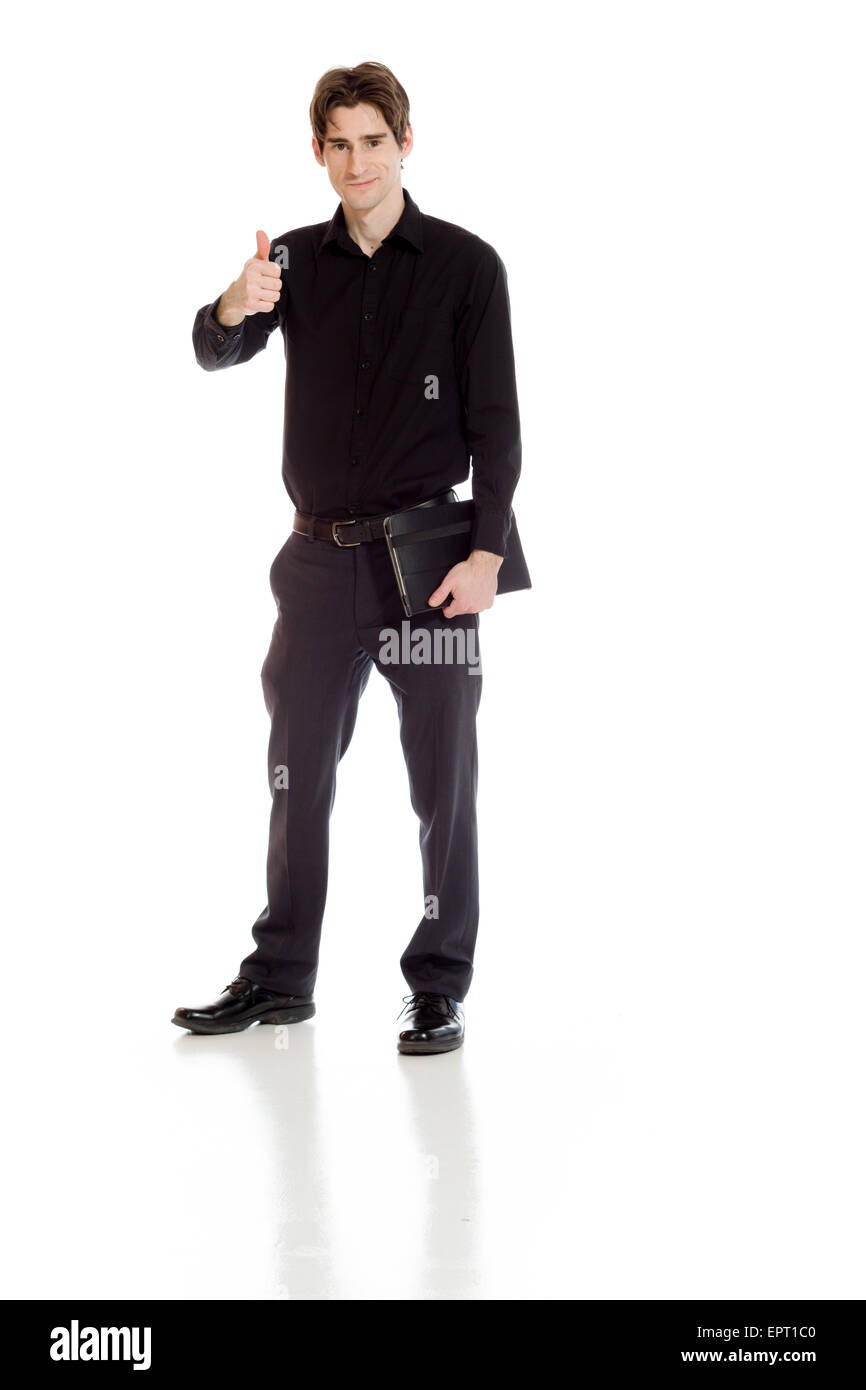 Model isolated on plain background in studio with tumbs up Stock Photo