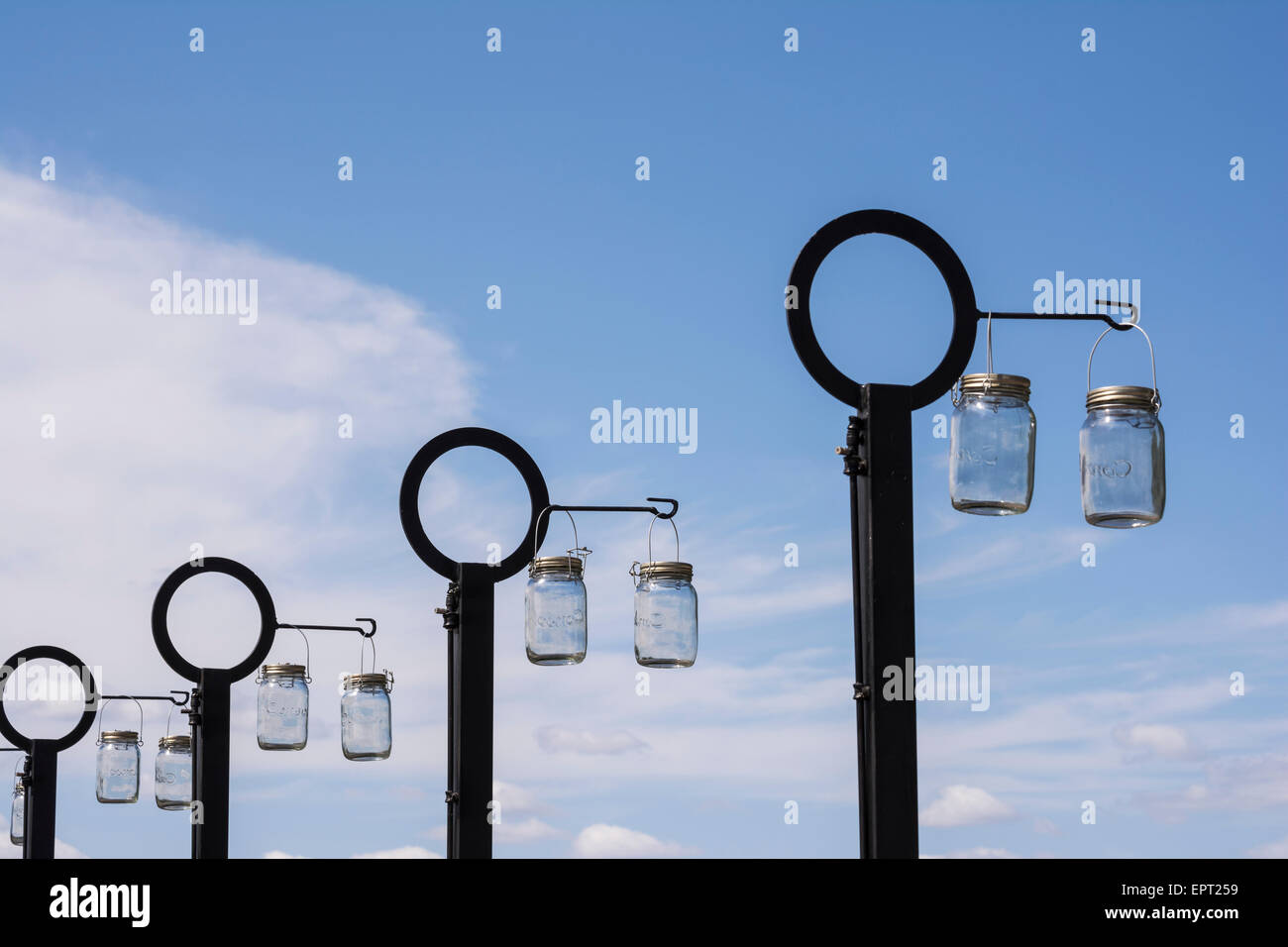 Solar lights hanging in the sun to charge Stock Photo