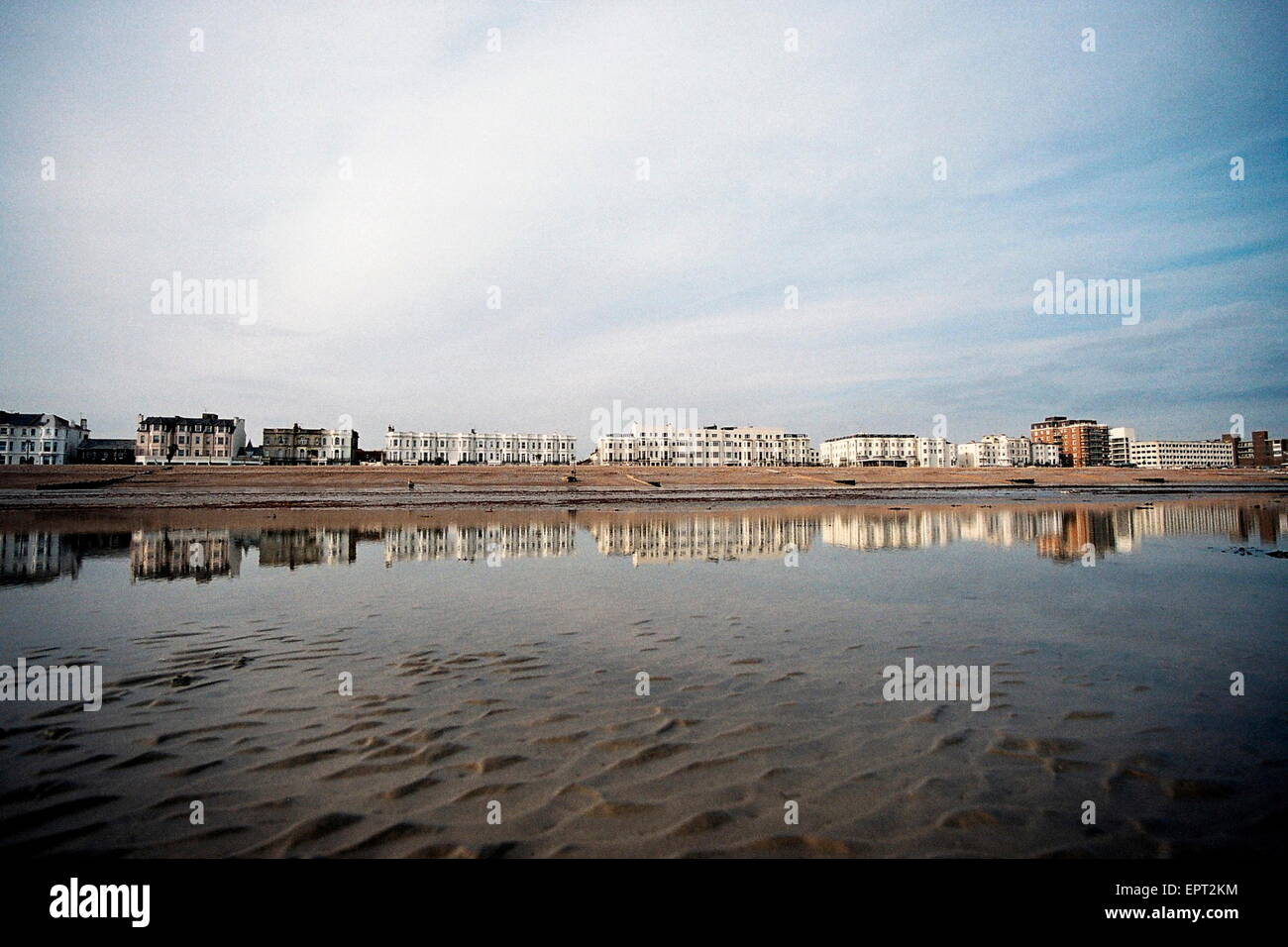 WORTHING, ENGLAND. SEA FRONT SEEN FROM SEAWARD AT LOW TIDE. PHOTOJONATHAN