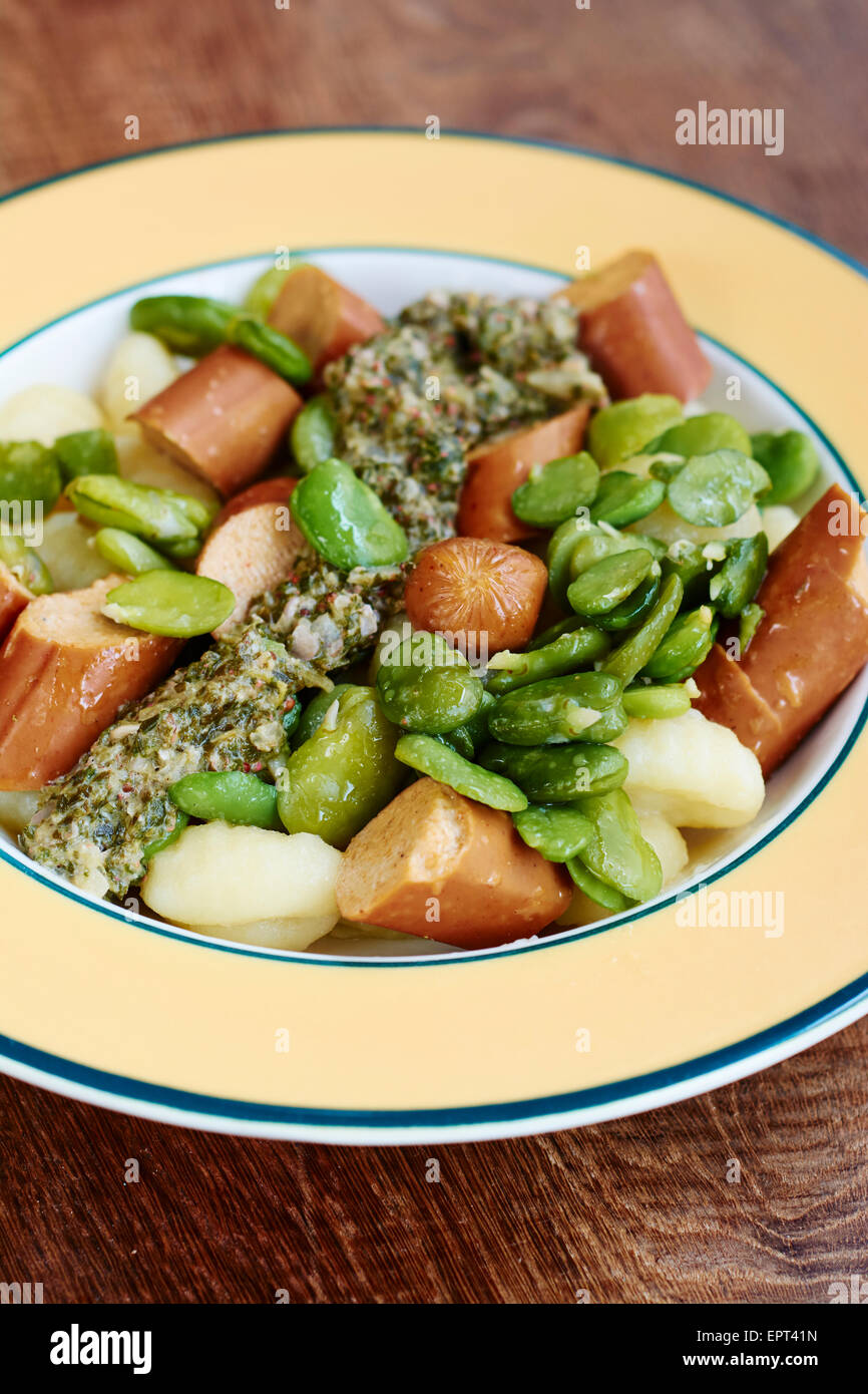 Gnocchi wit Vegan Hot Dogs Fava Beans and Spinach Sauce Stock Photo Alamy