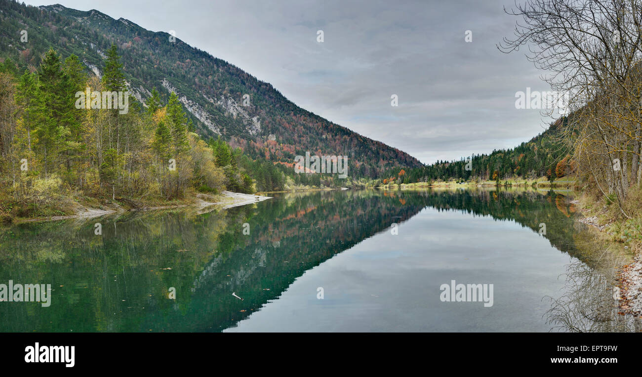 Scenic view of mountains reflected in a clear lake (Plansee) in autumn, Tirol, Austria Stock Photo