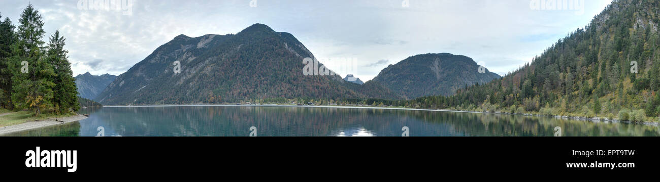 Scenic view of mountains and a clear lake (Plansee) in autumn, Tirol, Austria Stock Photo