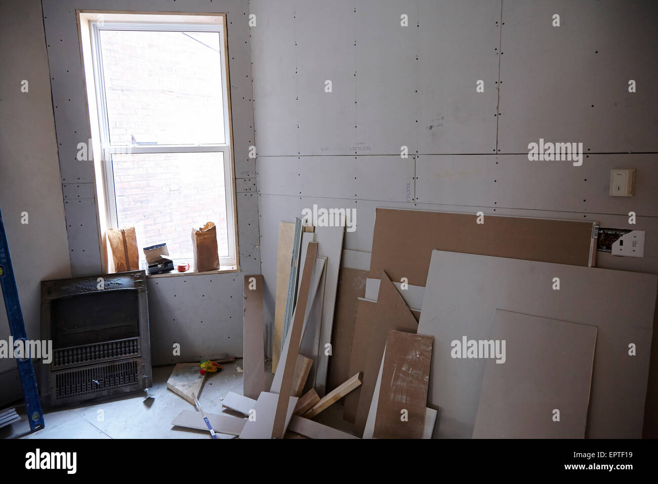 Drywall supplies in room at home renovation project, Canada Stock Photo