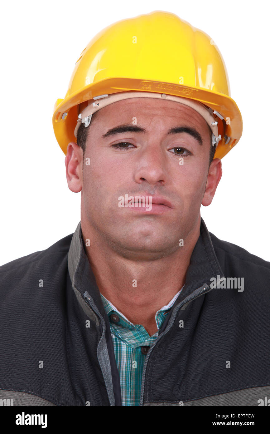 A bored construction worker. Stock Photo