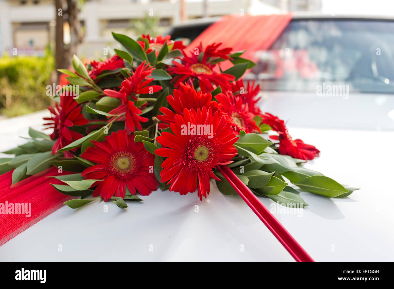 bouquet of flowers on wedding car Stock Photo Alamy