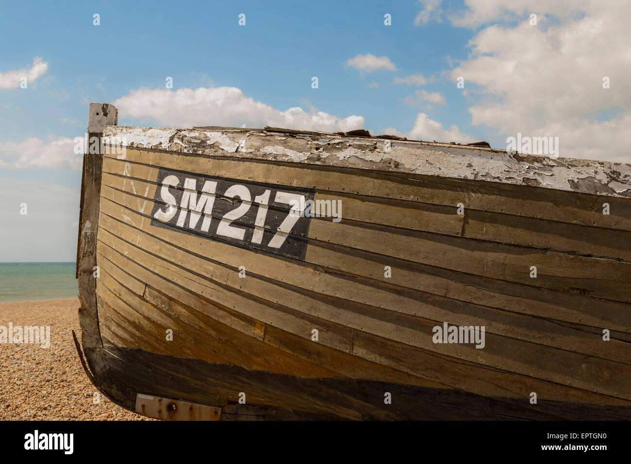 Historic fishing boat on the beach in front of the Brighton Fishing Museum on Brighton's seafront, East Sussex, UK. Stock Photo