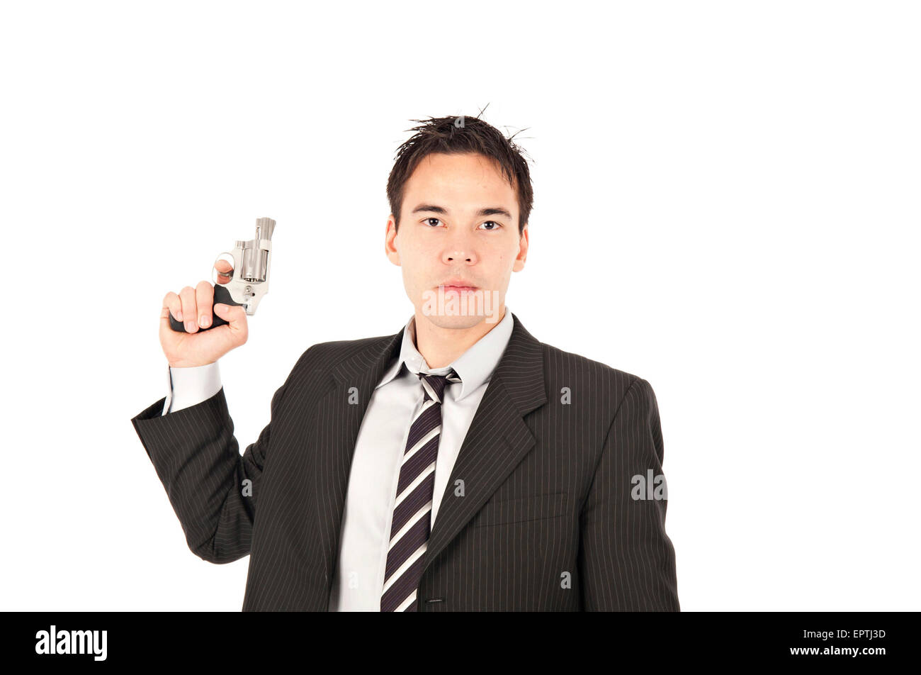 Man pointing a gun in the air Stock Photo