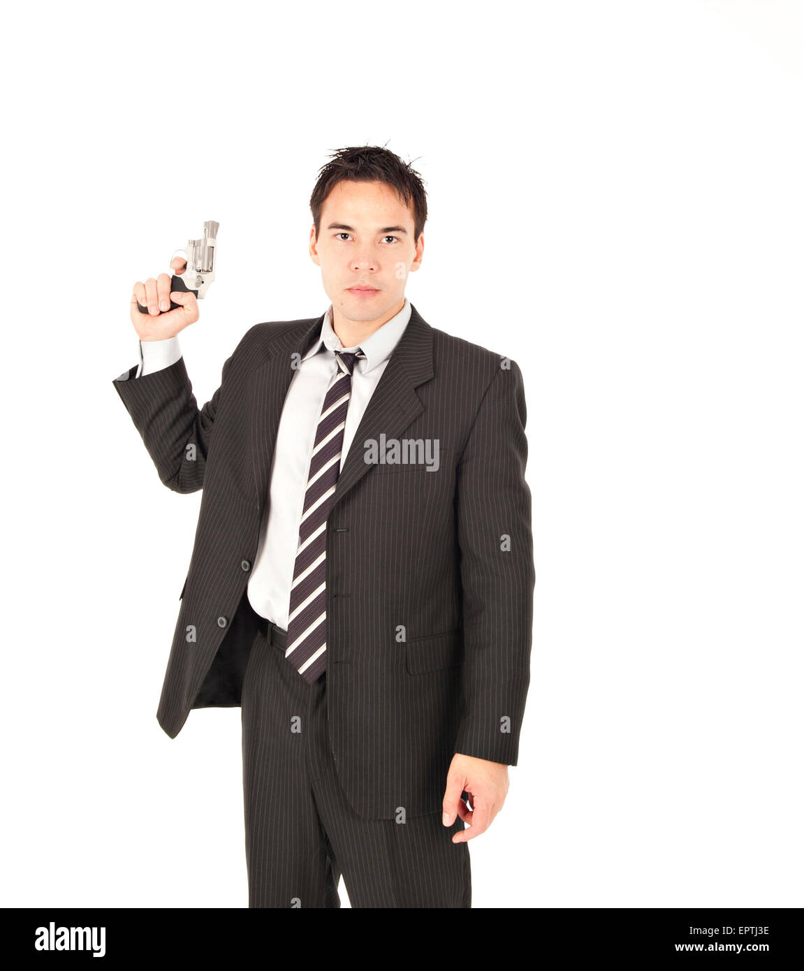 Man pointing a gun in the air Stock Photo