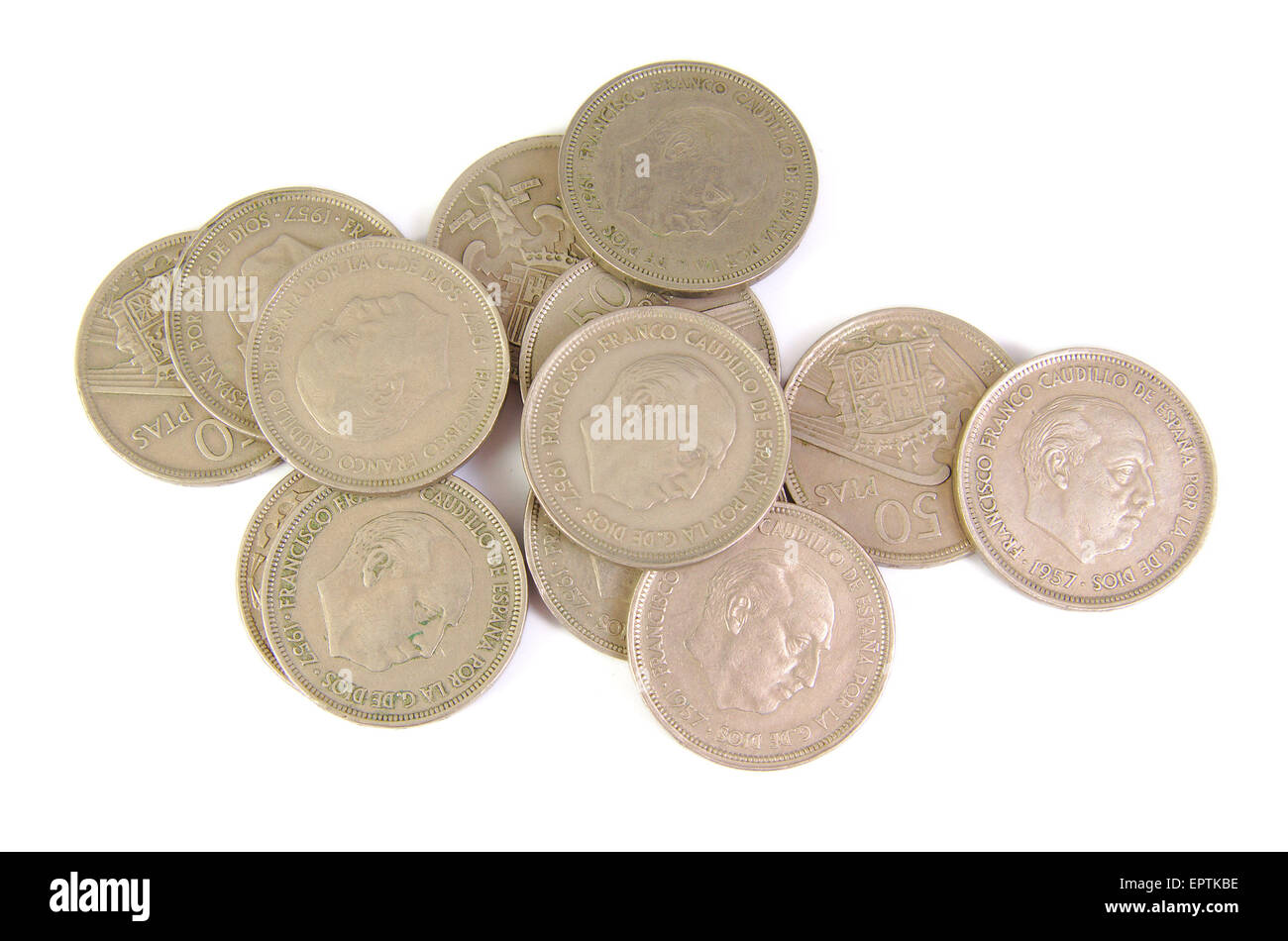 Bunch of old Spanish coins of 50 pesetas showing Franco dictator face on white background. 1957 Stock Photo