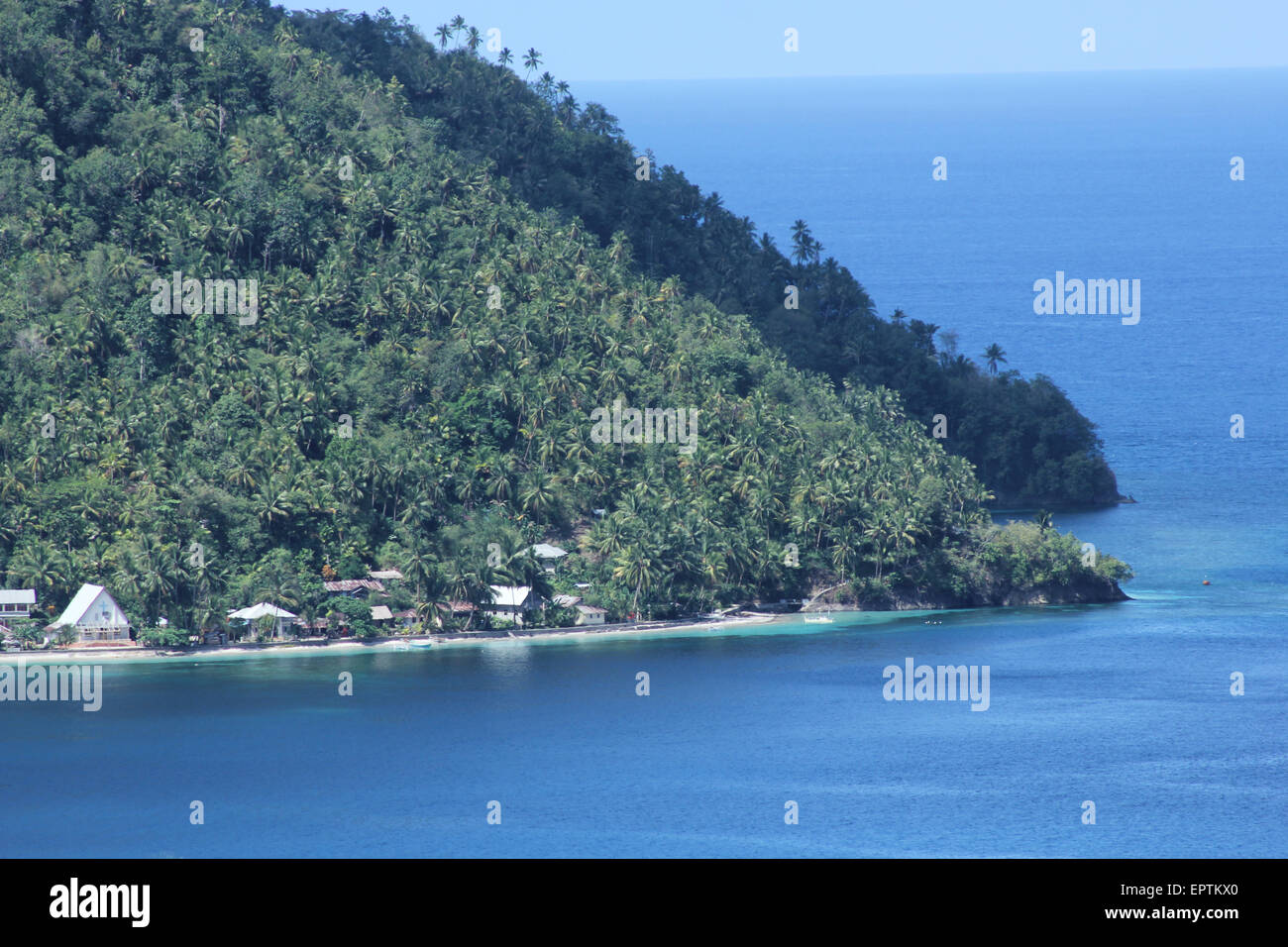 Talaud, Indonesia. 13th May, 2015. Manalu bay views photographed from a height on the island Sangir. - Sangir island in the most northern part of the province of North Sulawesi, has a very beautiful panorama and still awake. The original nature is maintained, because people still live modestly and continue to keep the surrounding environment. Sangir island entered the territory of the district administration Sangihe, which is bordered by the Philippines. © Bios Andi Lariwu/Pacific Press/Alamy Live News Stock Photo