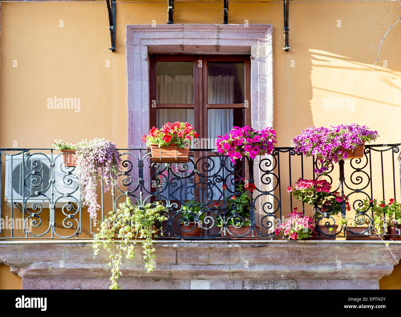 Traditional Houses With Balconies and Flowers Bosa Sardinia Italy Stock Photo