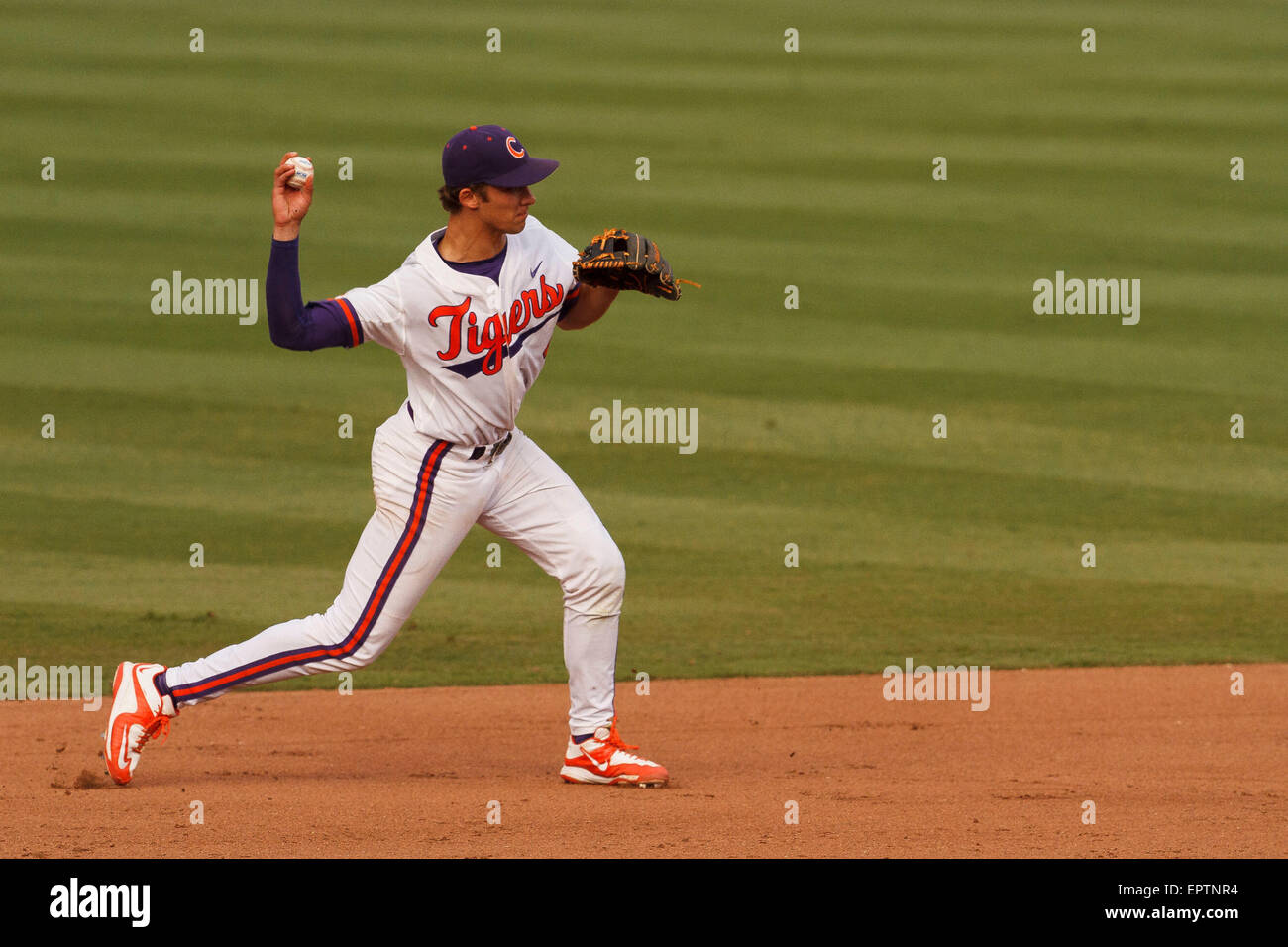 infielder Eli White (4) of the Clemson Tigers makes a bad throw to