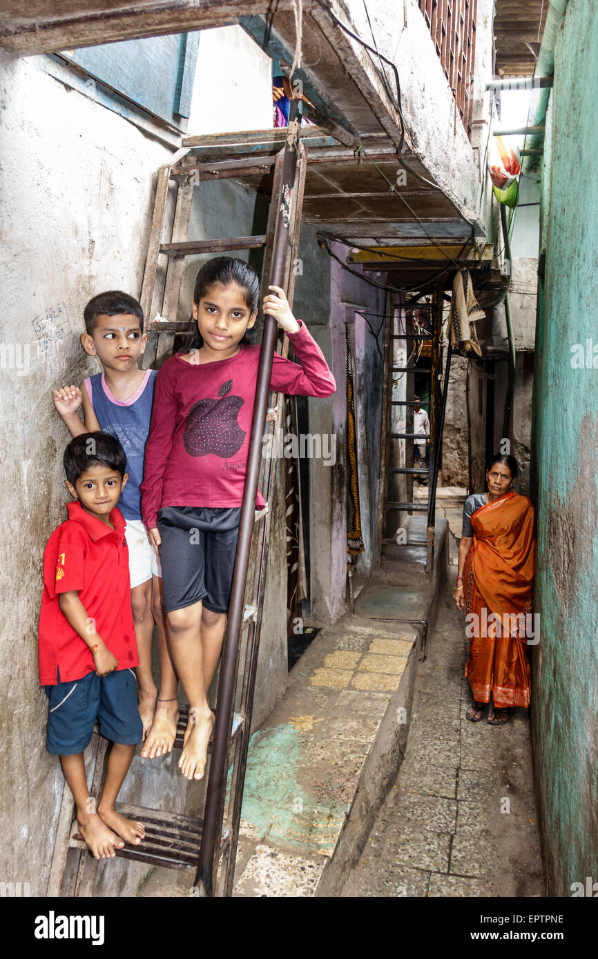 Mumbai India,Dharavi,Kumbhar Wada,slum,high population density,poverty,low income,poor,resident,residents,male boy boys kids children girl girls,femal Stock Photo