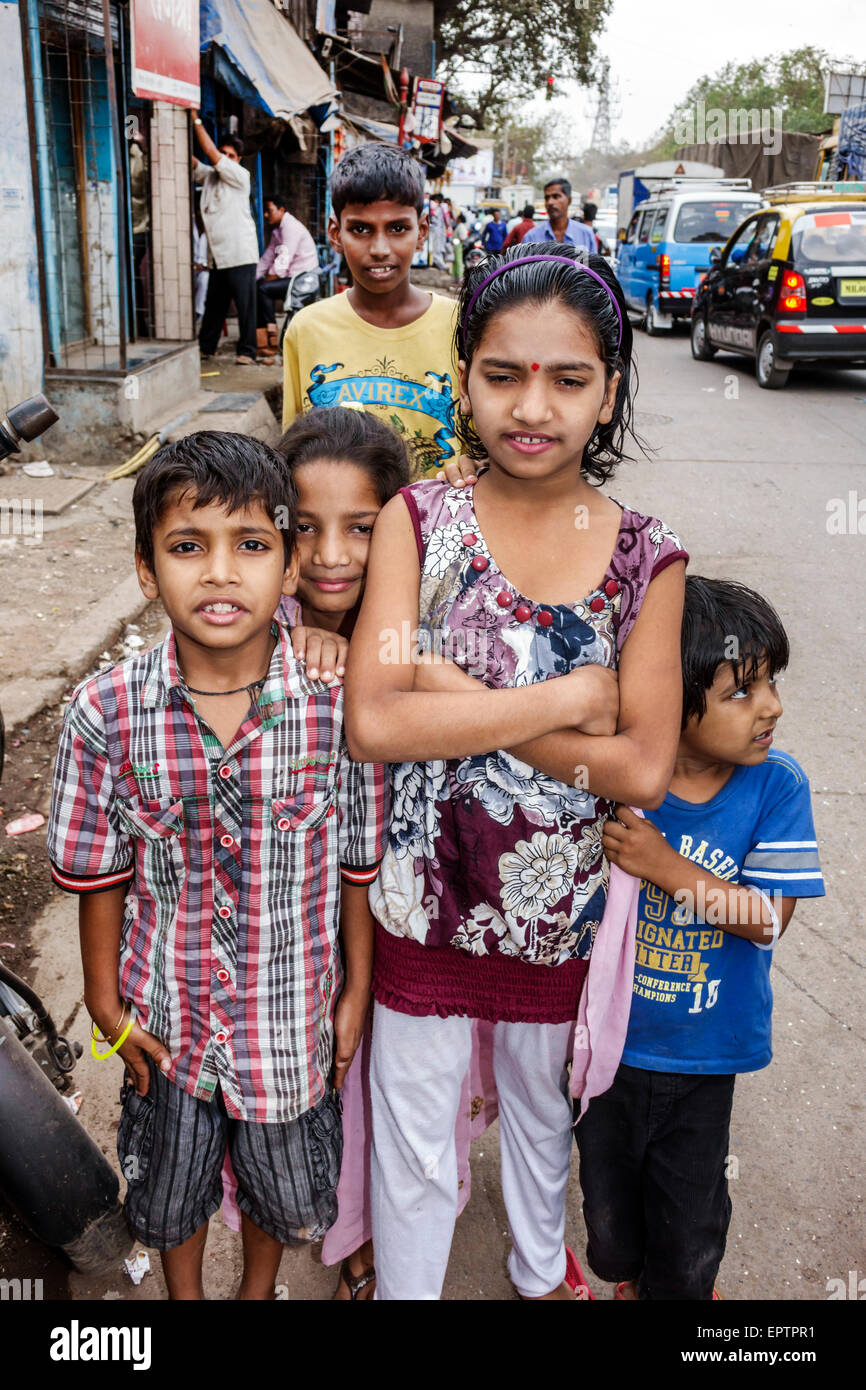 Mumbai India,Indian Asian,Dharavi,low income,poor,poverty,60 Feet Road,slum,male boy boys lad lads kid kids child children,girl girls,female youngster Stock Photo