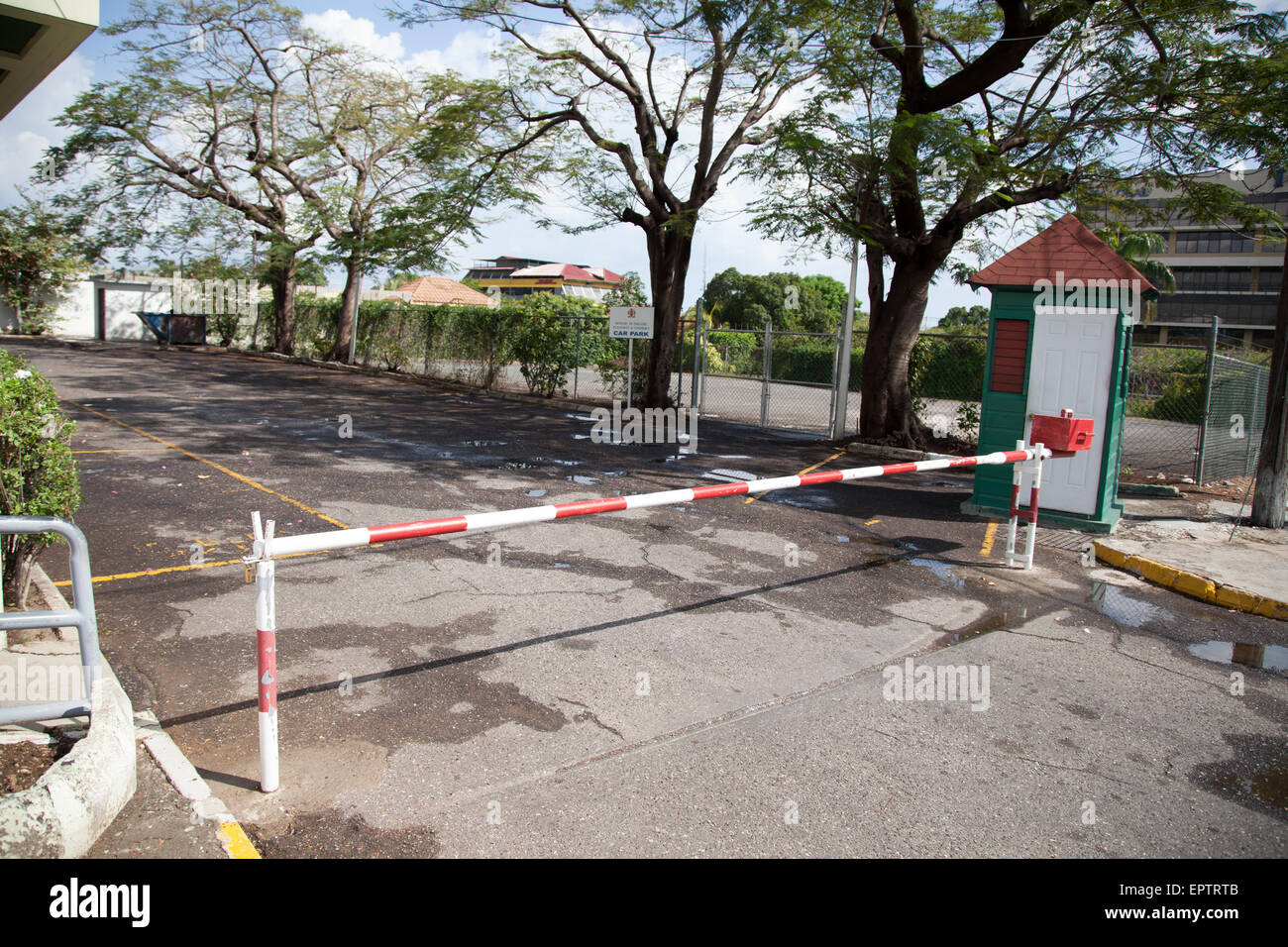 Security barrier on the road, Jamaica Stock Photo