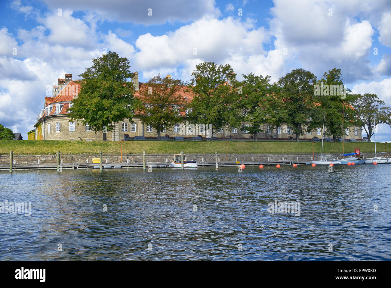 The red roof house. The view from the channel Holmen. Copenhagen. Denmark. Stock Photo