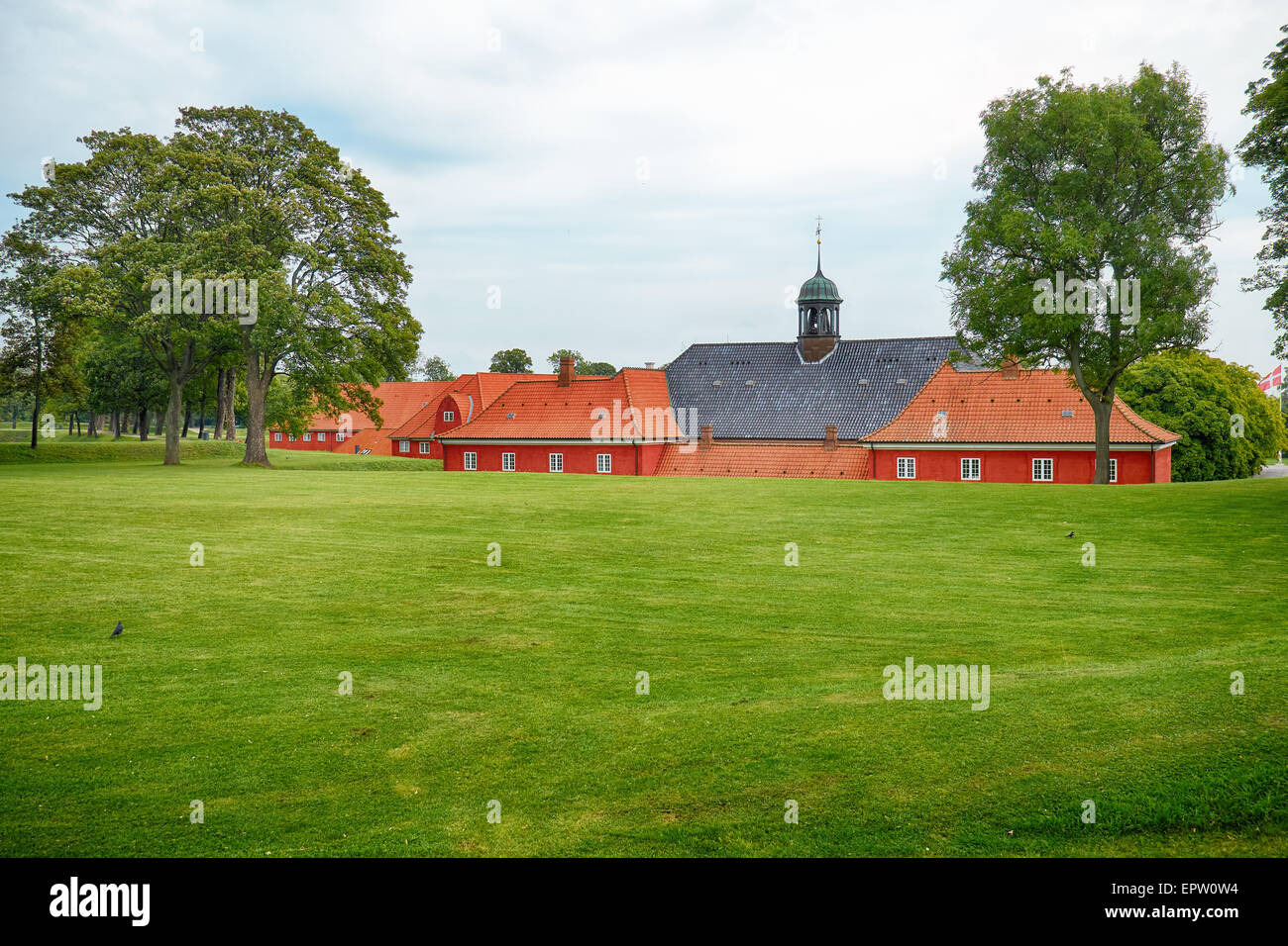 The back side of the church and prison with lawn in Kastellet, Copenhagen. Stock Photo
