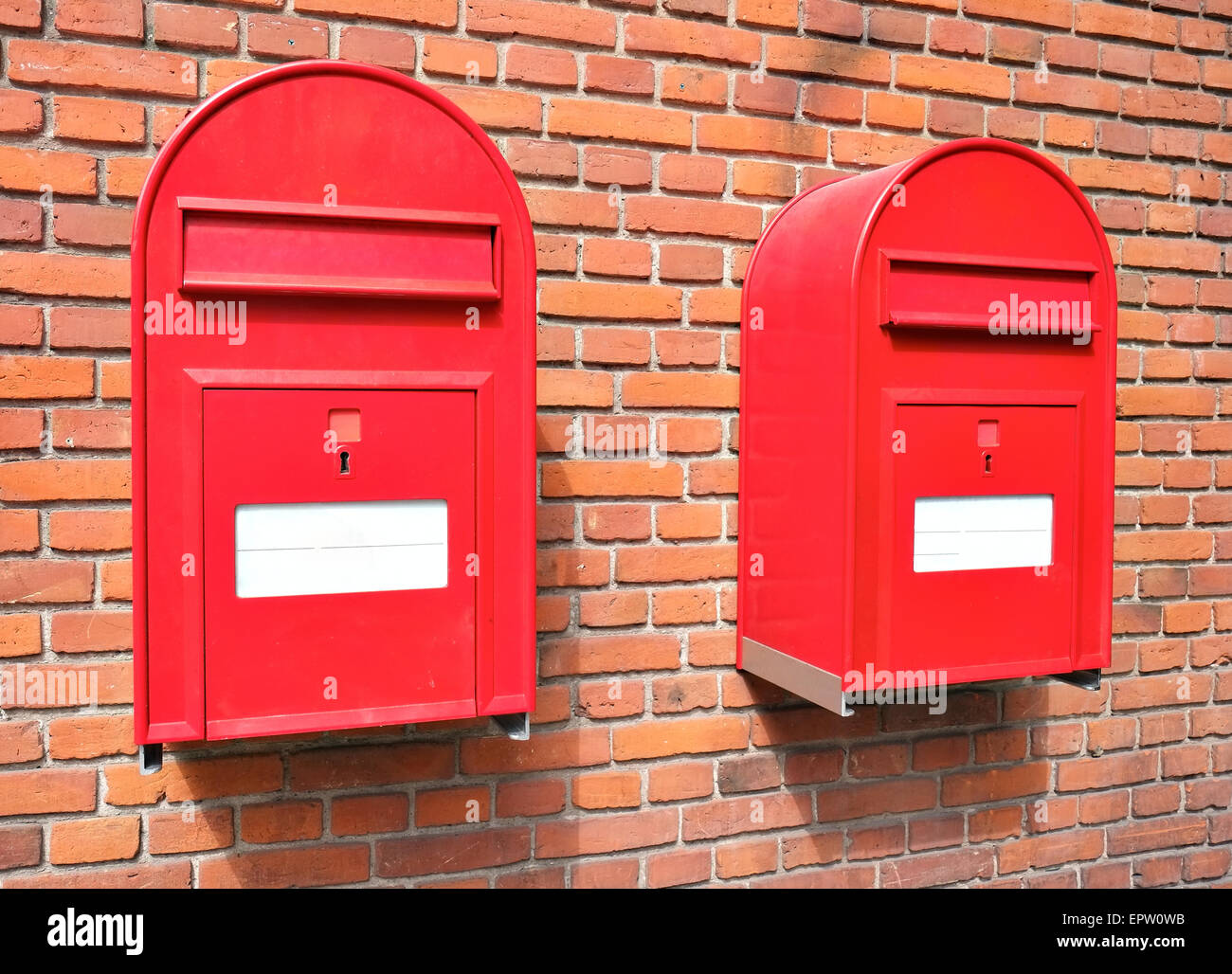 Old red mail boxes on brick wall Stock Photo Alamy