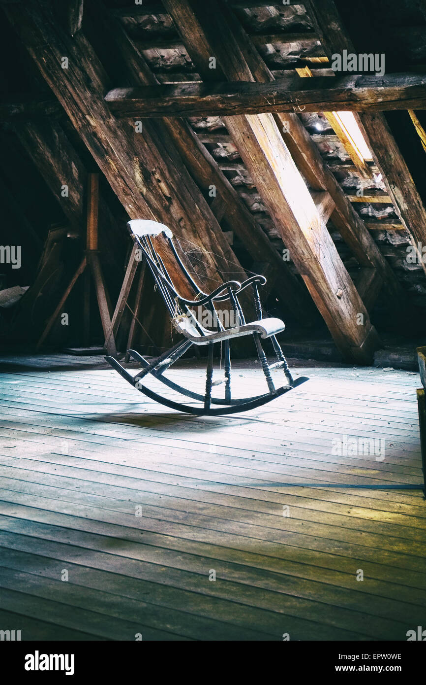 Vintage rocking chair on deserted old attic floor in Round Tower in ...