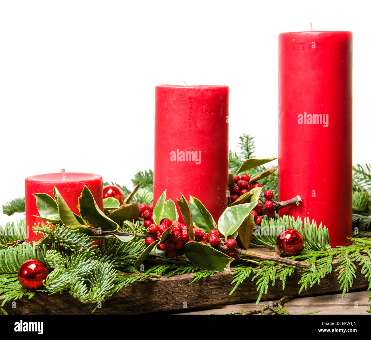 Group of red Christmas candles with a white background Stock Photo