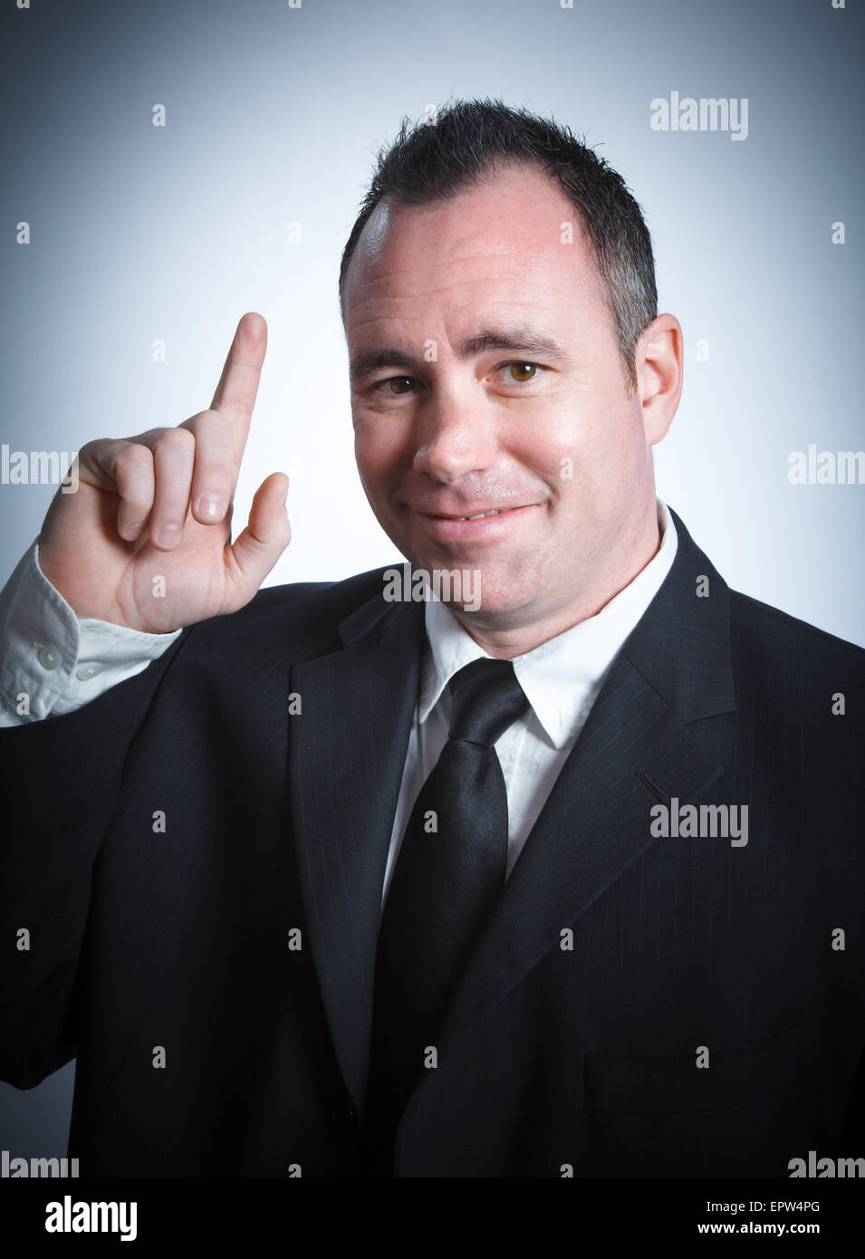 Caucasian businessman 40 years old isolated on a grey background Stock Photo