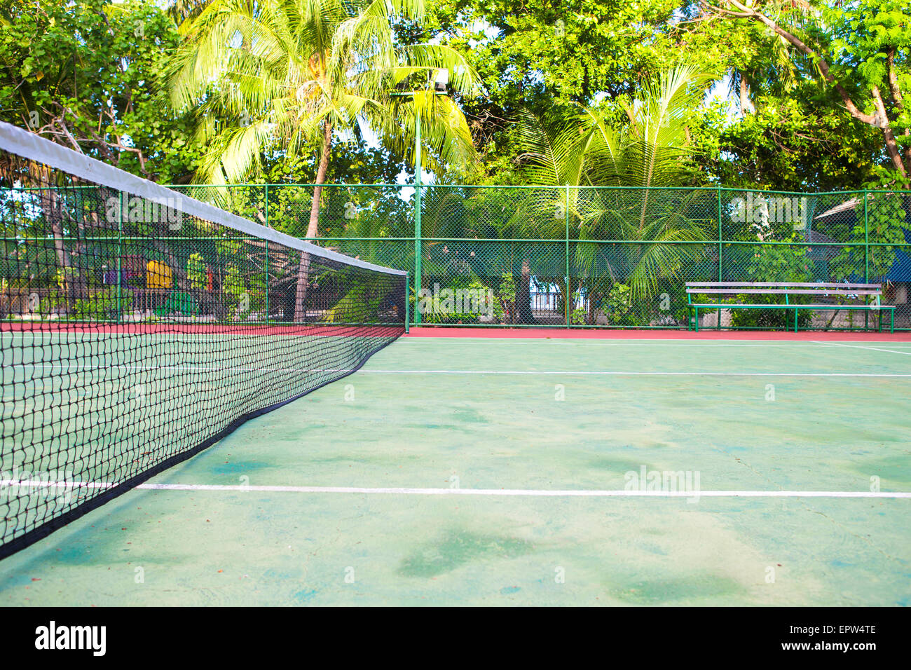 Tennis court on exotic tropical island - sport background Stock Photo -  Alamy