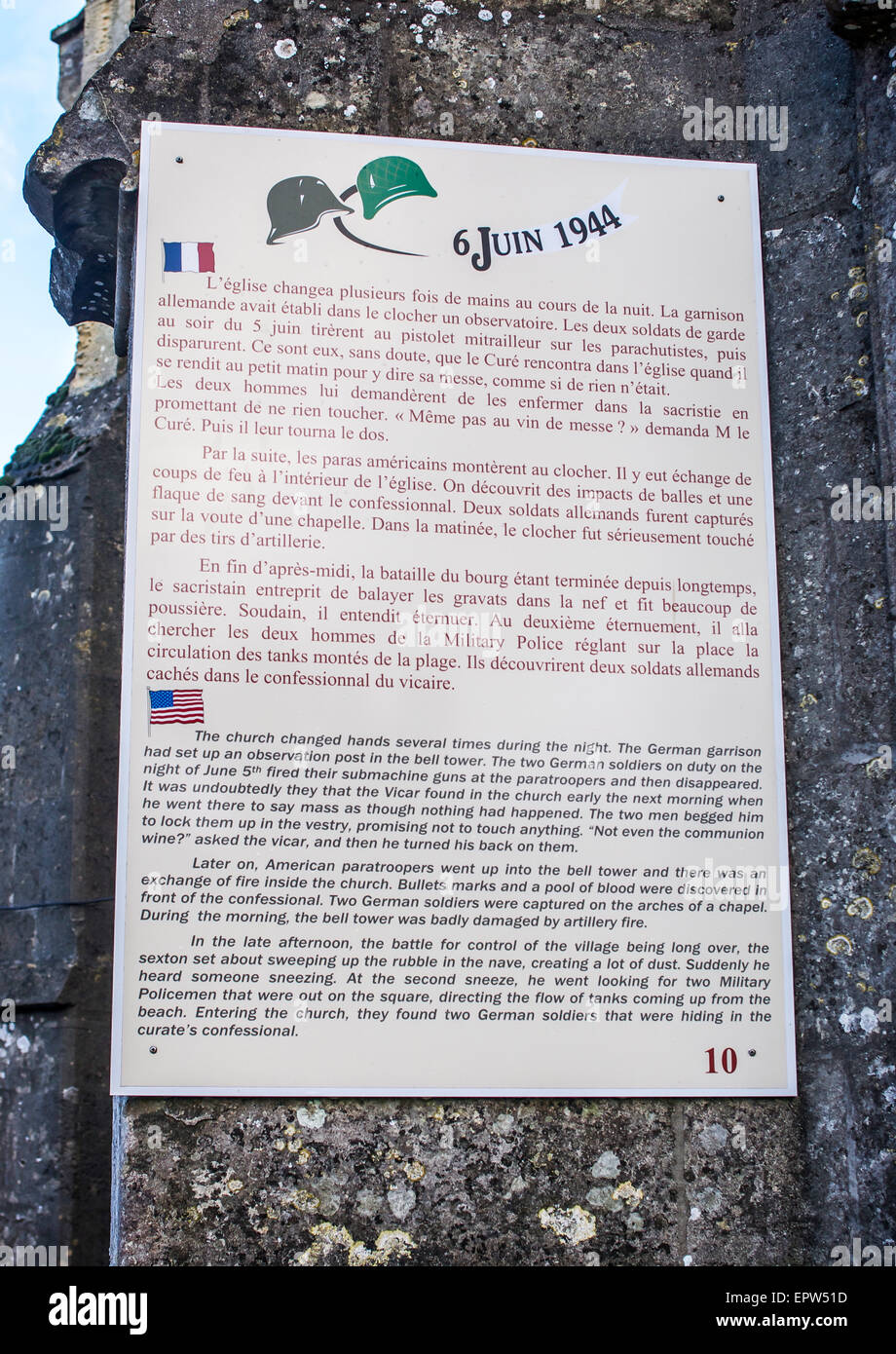 Plaque mounted on side wall of the eglise (church) in the historic World War II D-Day Invasion village of Saint Marie Du Mont. Stock Photo